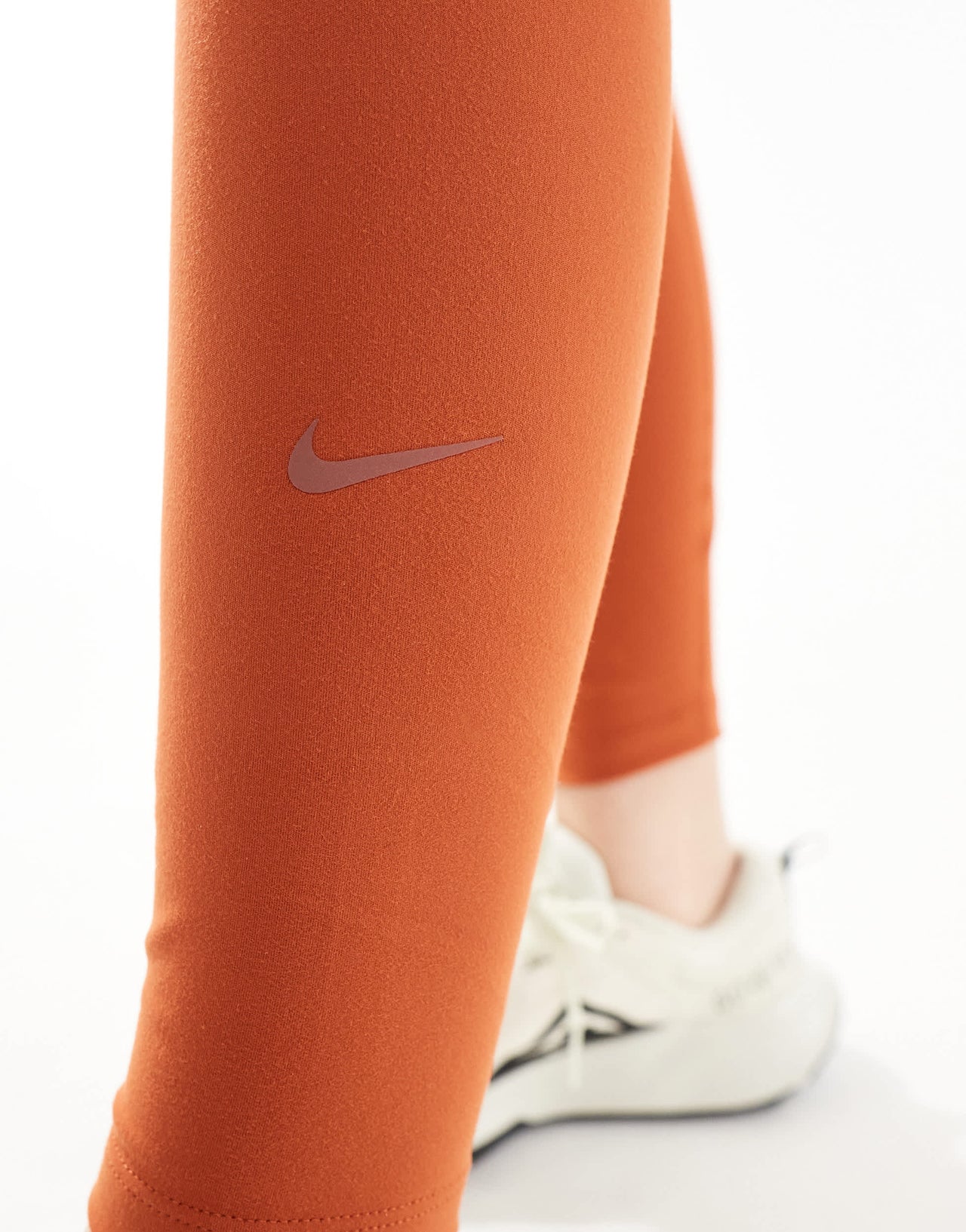Nike One Training Dri-Fit high rise leggings in burnt orange