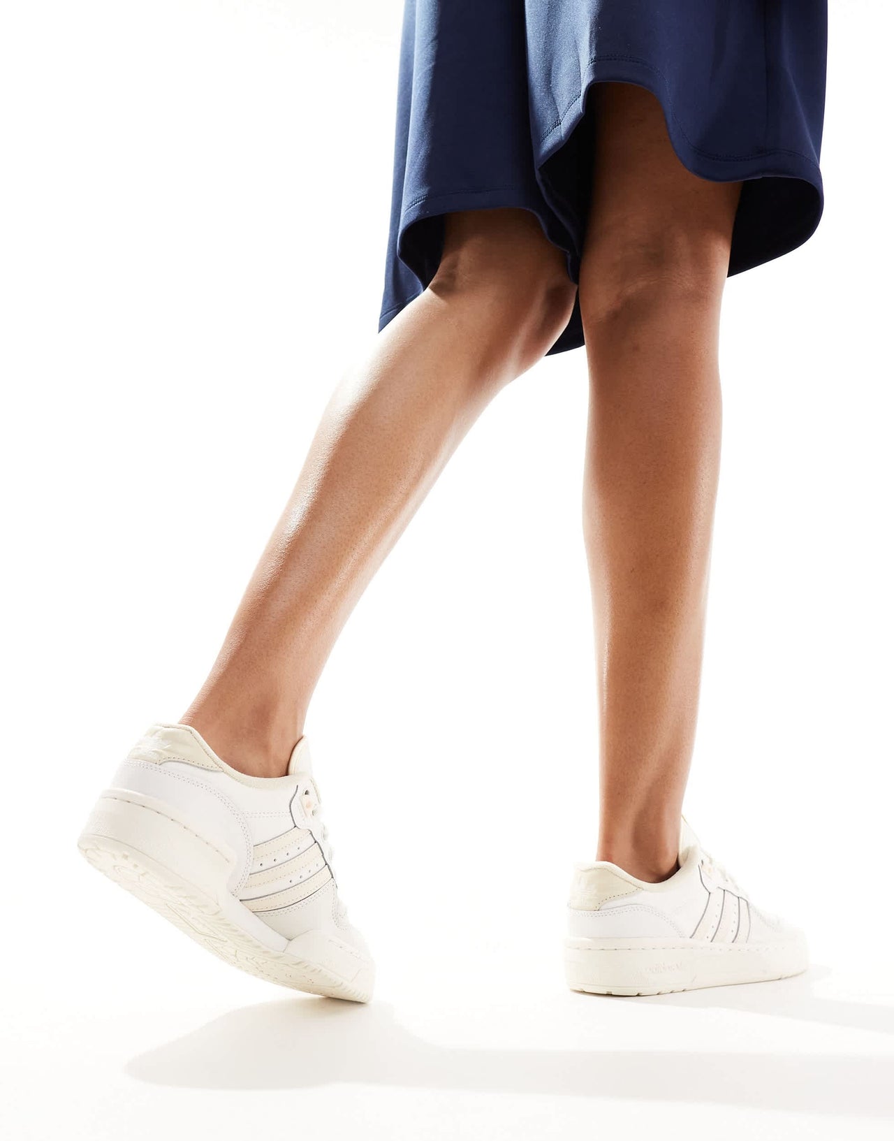 adidas Originals Rivalry low trainers in white and pale pink