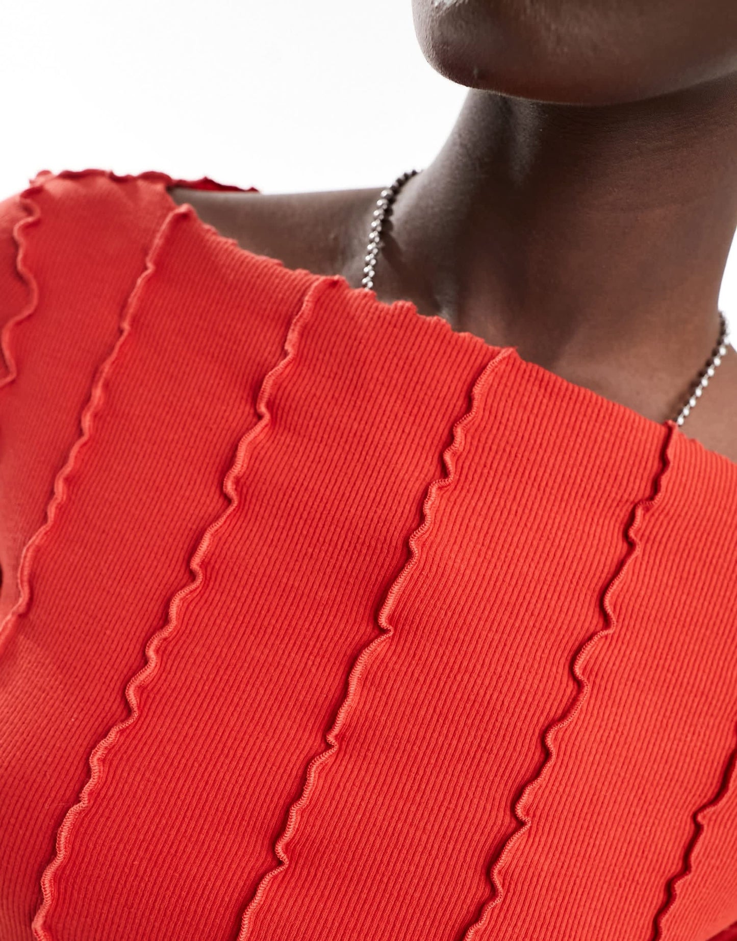 Monki overlock seam detail ribbed jersey top in red