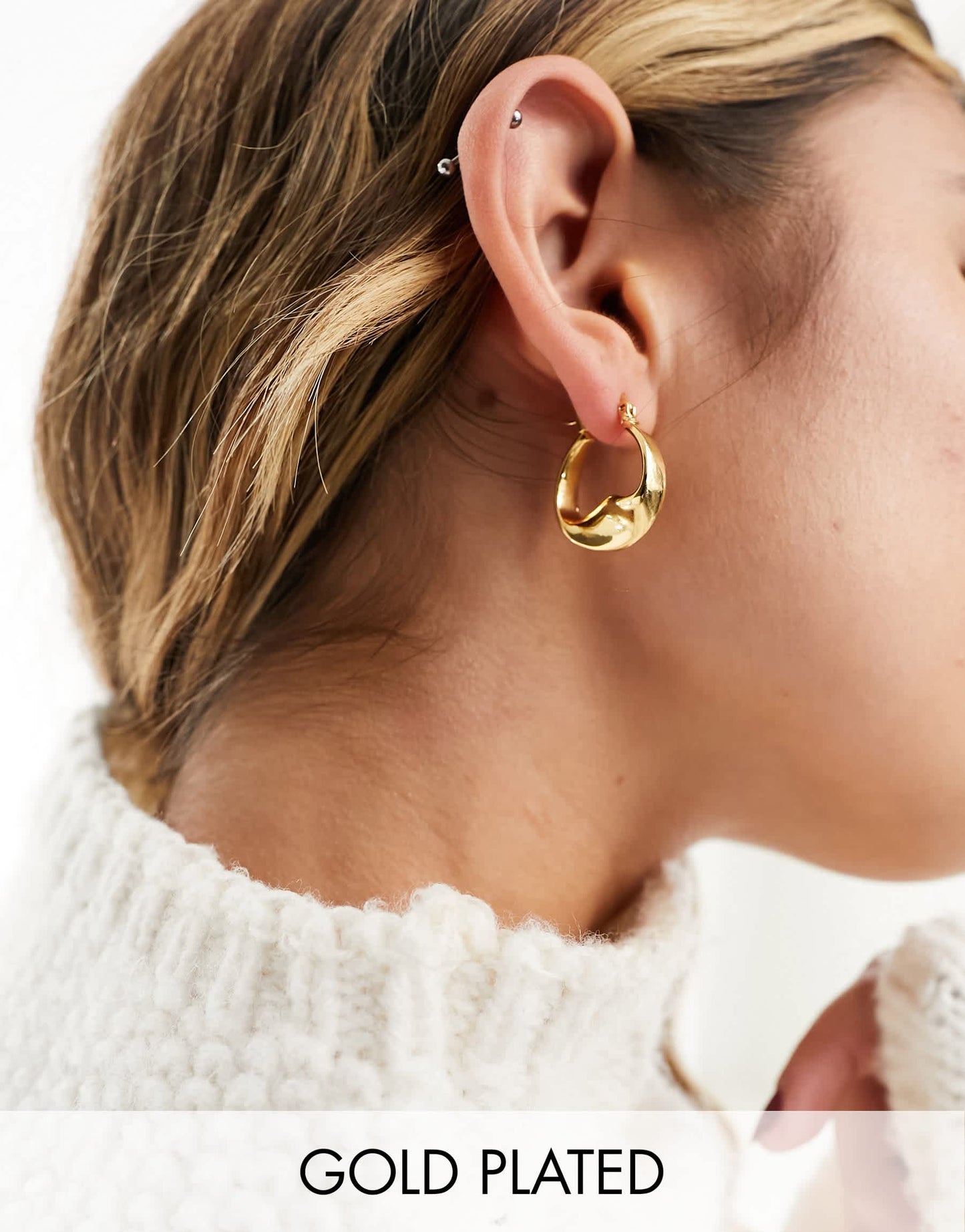 ASOS DESIGN 14k gold plated 25mm hoop earrings with twist middle design