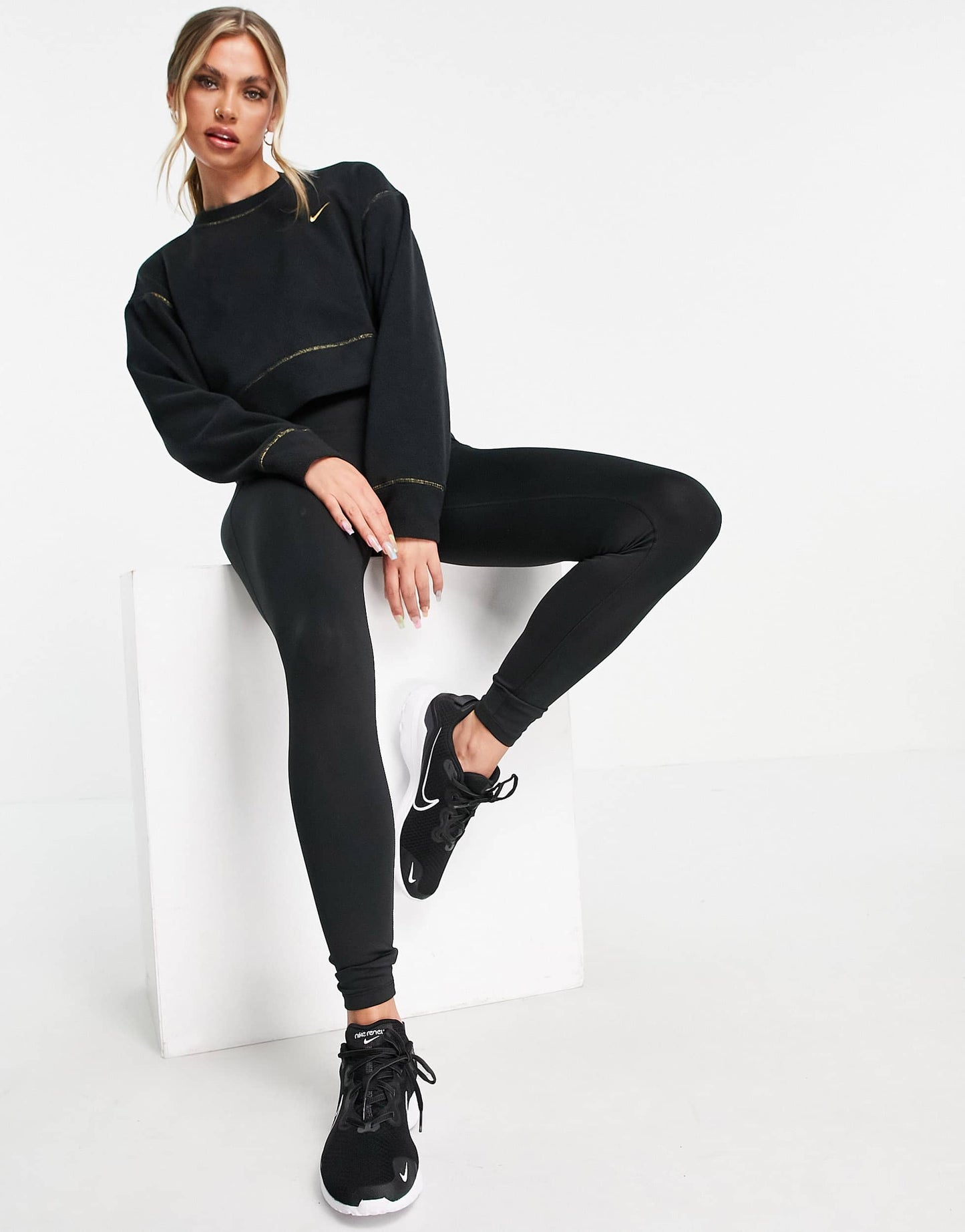 Nike Training Icon Clash sweatshirt in black and gold