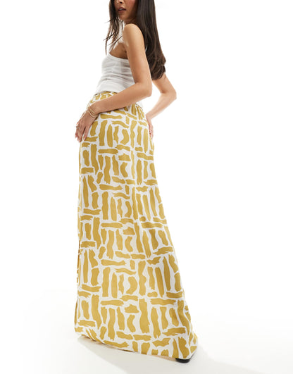 ASOS DESIGN tie waist midi skirt in mustard squiggle print