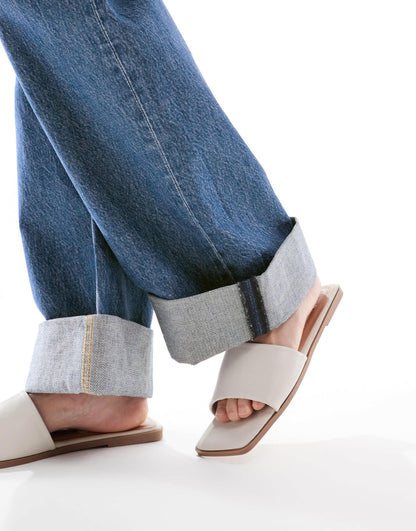 ASOS DESIGN loose jeans with deep turn up cuff in dark vintage blue