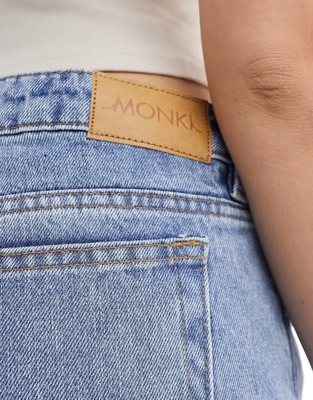 Monki Imoo low waisted wide fit jeans in mid blue wash