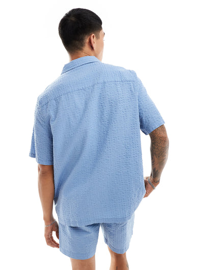 ASOS DESIGN co-ord 90s oversized short sleeve shirt in seersucker texture in dusty blue