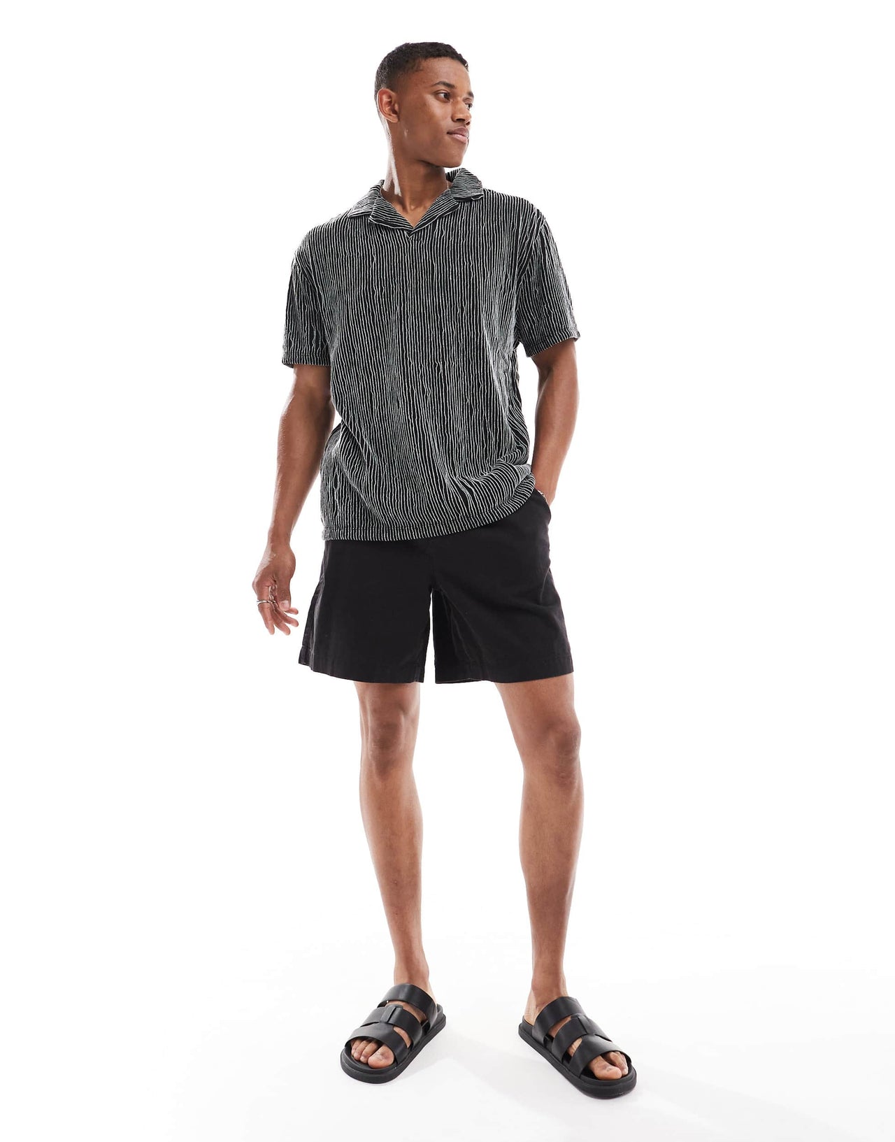 ASOS DESIGN relaxed revere polo in black textured stripe