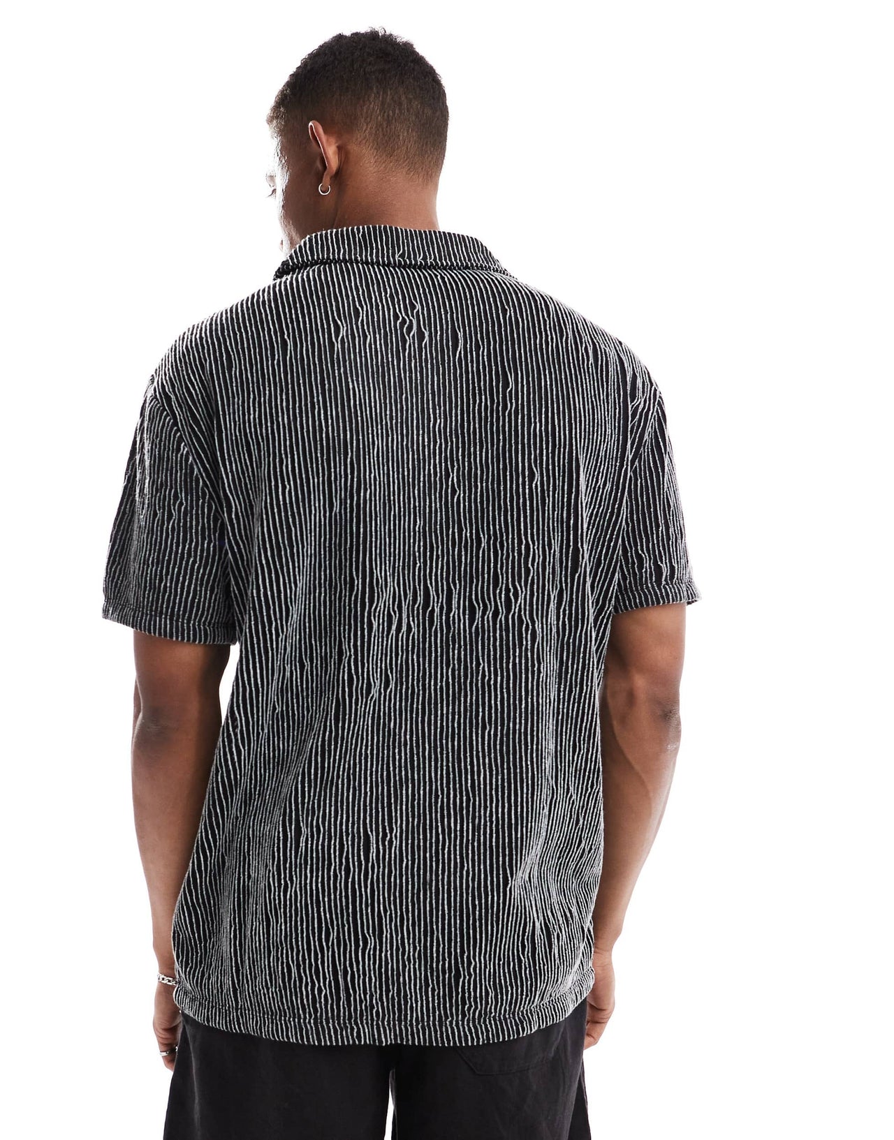 ASOS DESIGN relaxed revere polo in black textured stripe