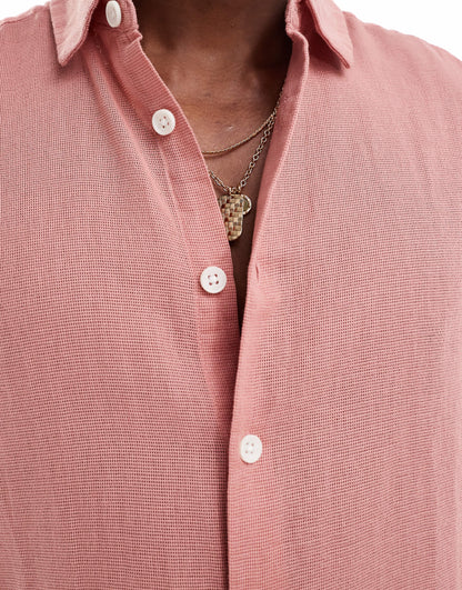 ASOS DESIGN relaxed textured shirt with patch pockets in pink