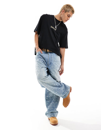 Timberland large script logo back print oversized t-shirt in black Exclusive to Asos