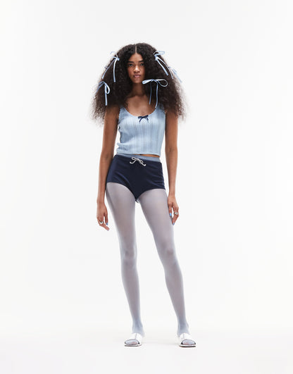 ASOS DESIGN knitted cami top in pointelle stitch with contrast bow detail in blue