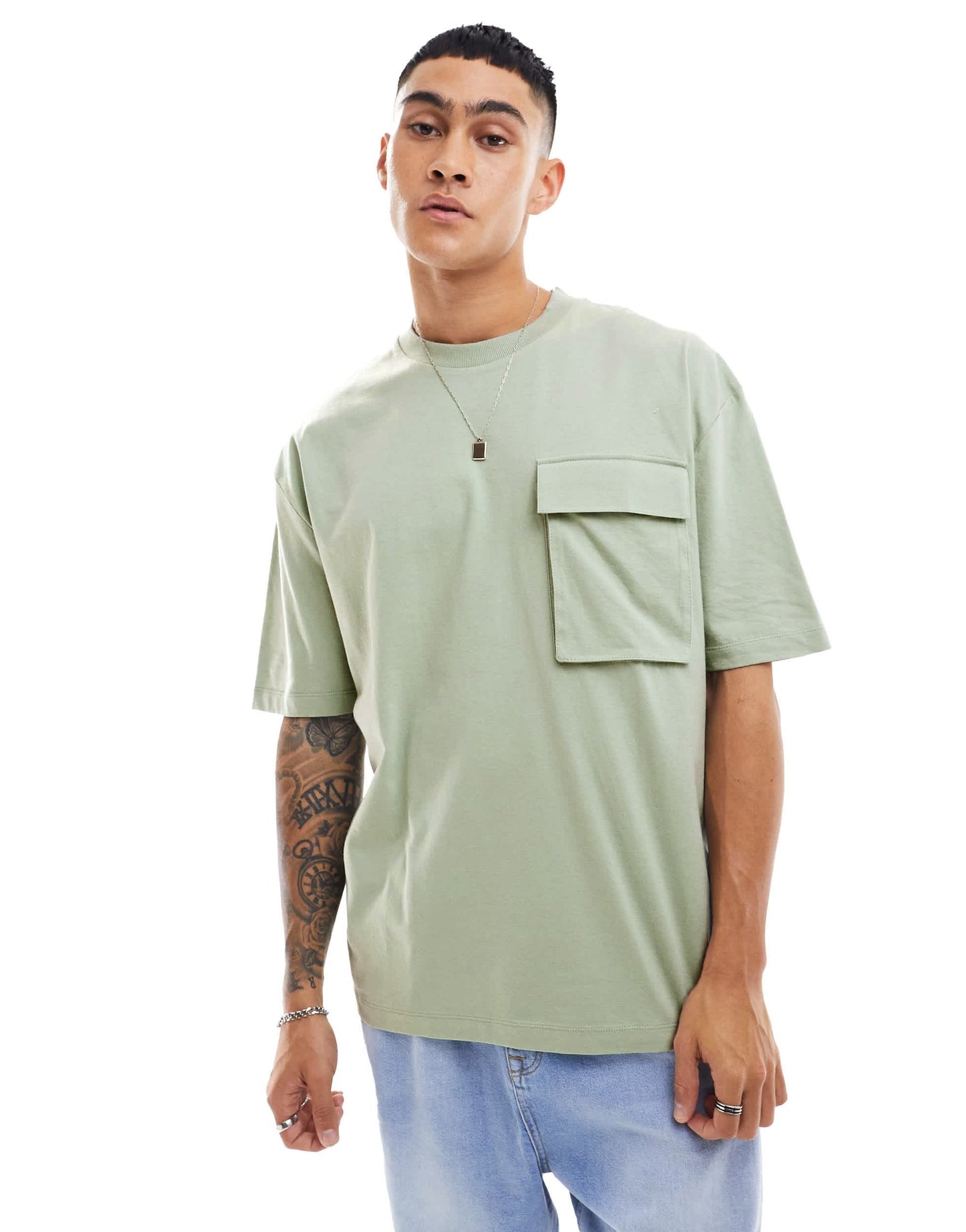ASOS DESIGN oversized t-shirt with front pocket in washed green