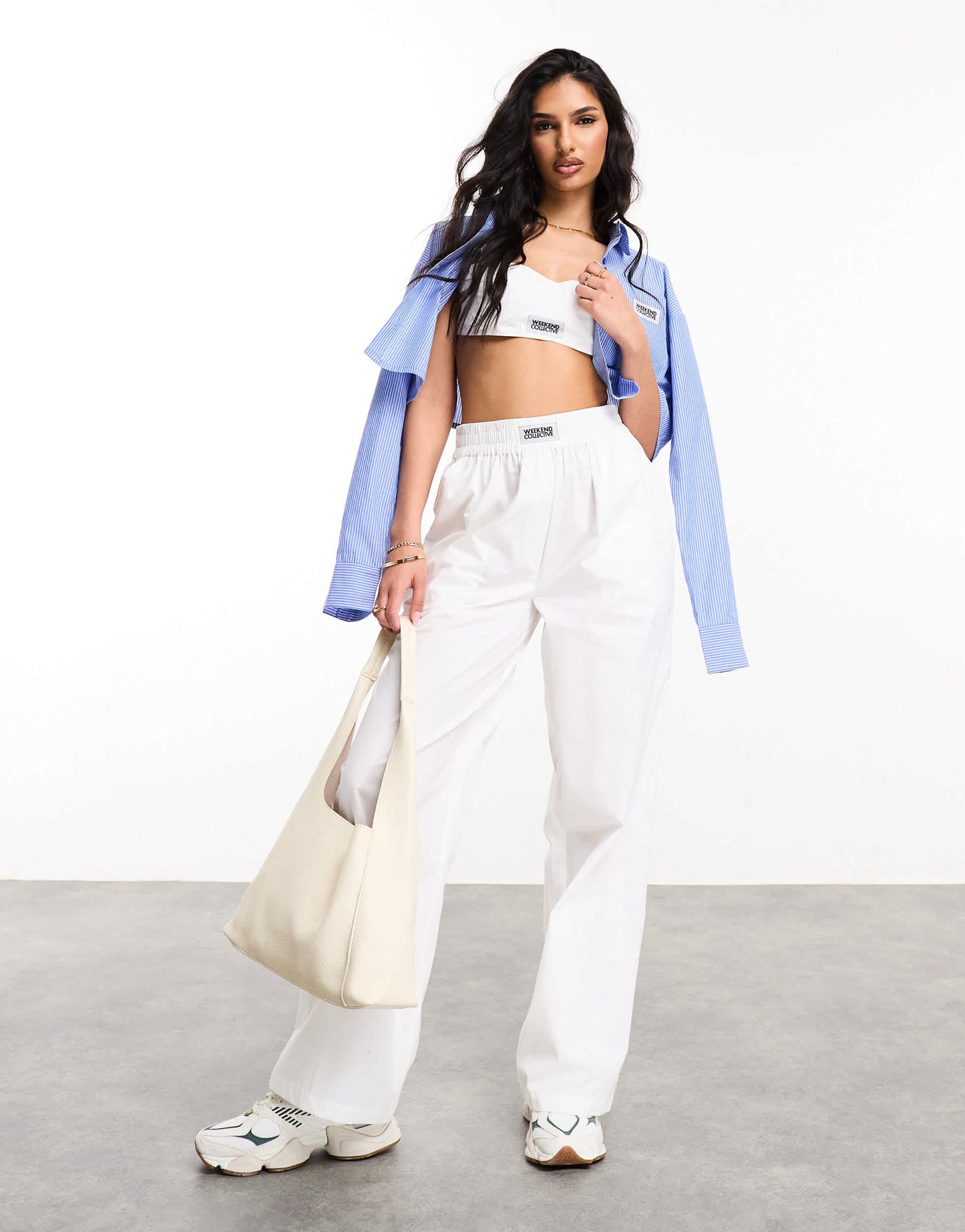 Weekend Collective woven trousers with label in white