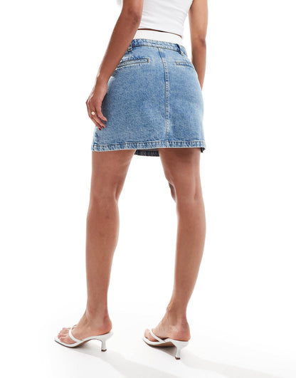 ASOS DESIGN denim mini skirt with boxer waistband in bleach wash