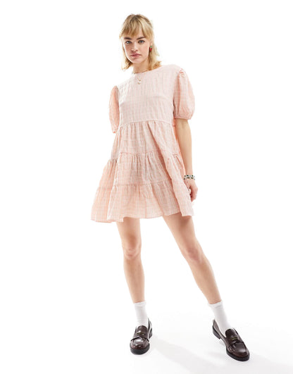 Glamorous short sleeve pleated smock dress in seersucker pink check