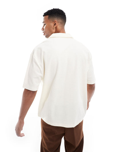 ASOS DESIGN oversized button through texture polo with embroidery