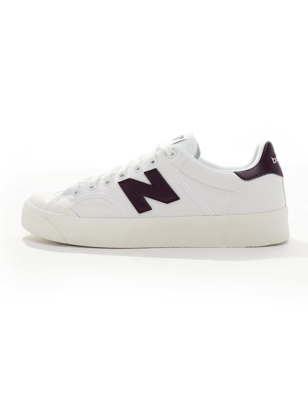 New Balance 100 trainers in white and burgundy