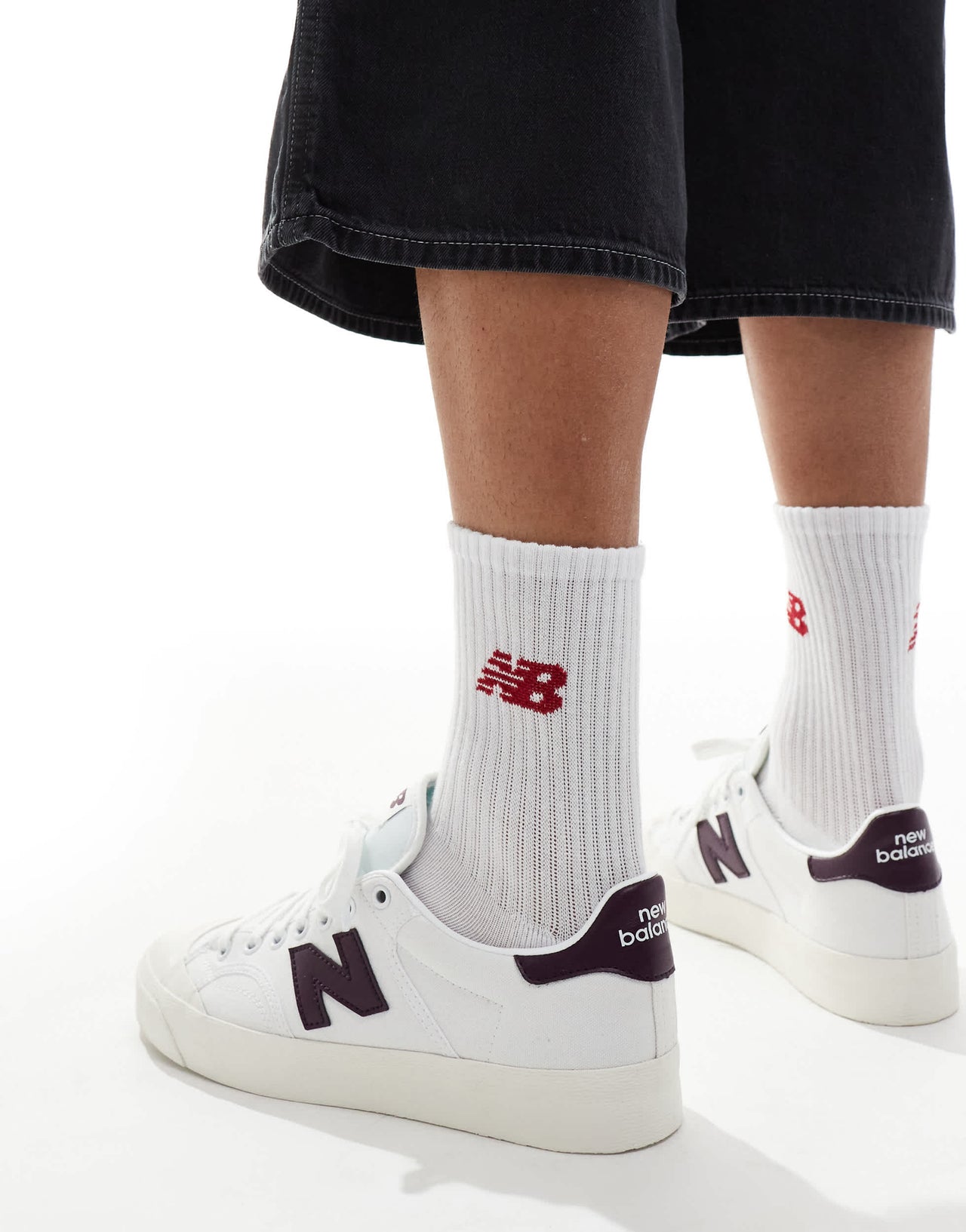 New Balance 100 trainers in white and burgundy