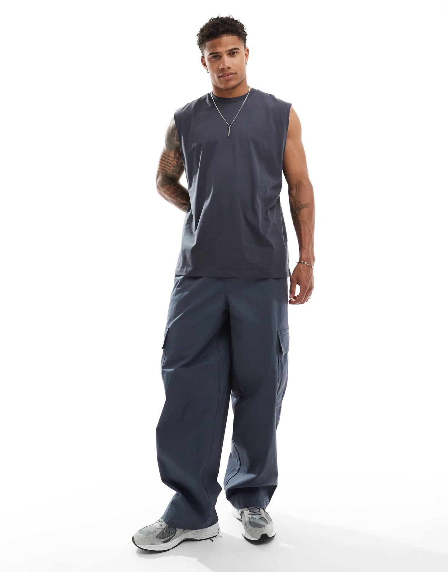 ASOS DESIGN oversized vest in charcoal with Fort Lauderdale back print