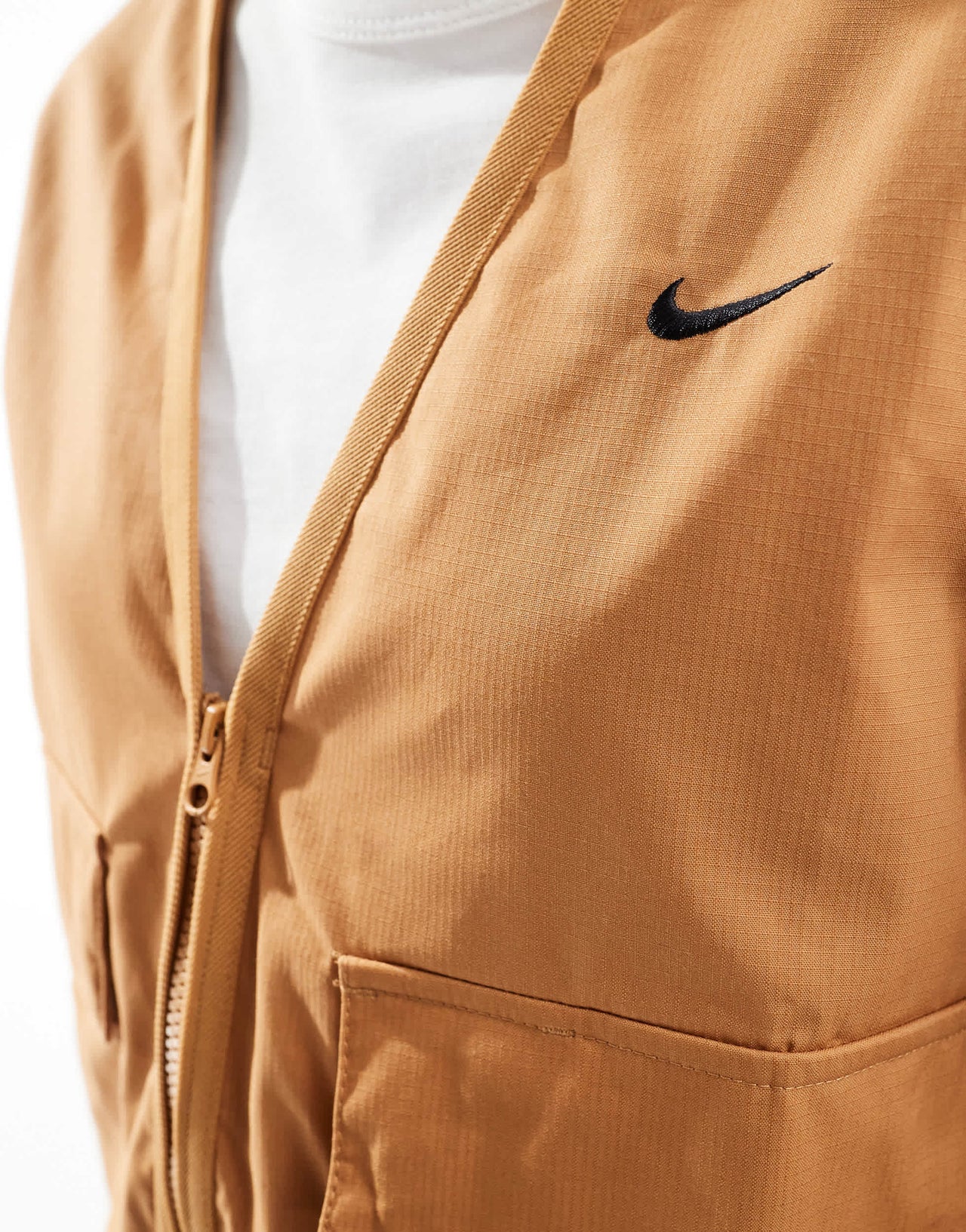 Nike woven cargo vest in brown