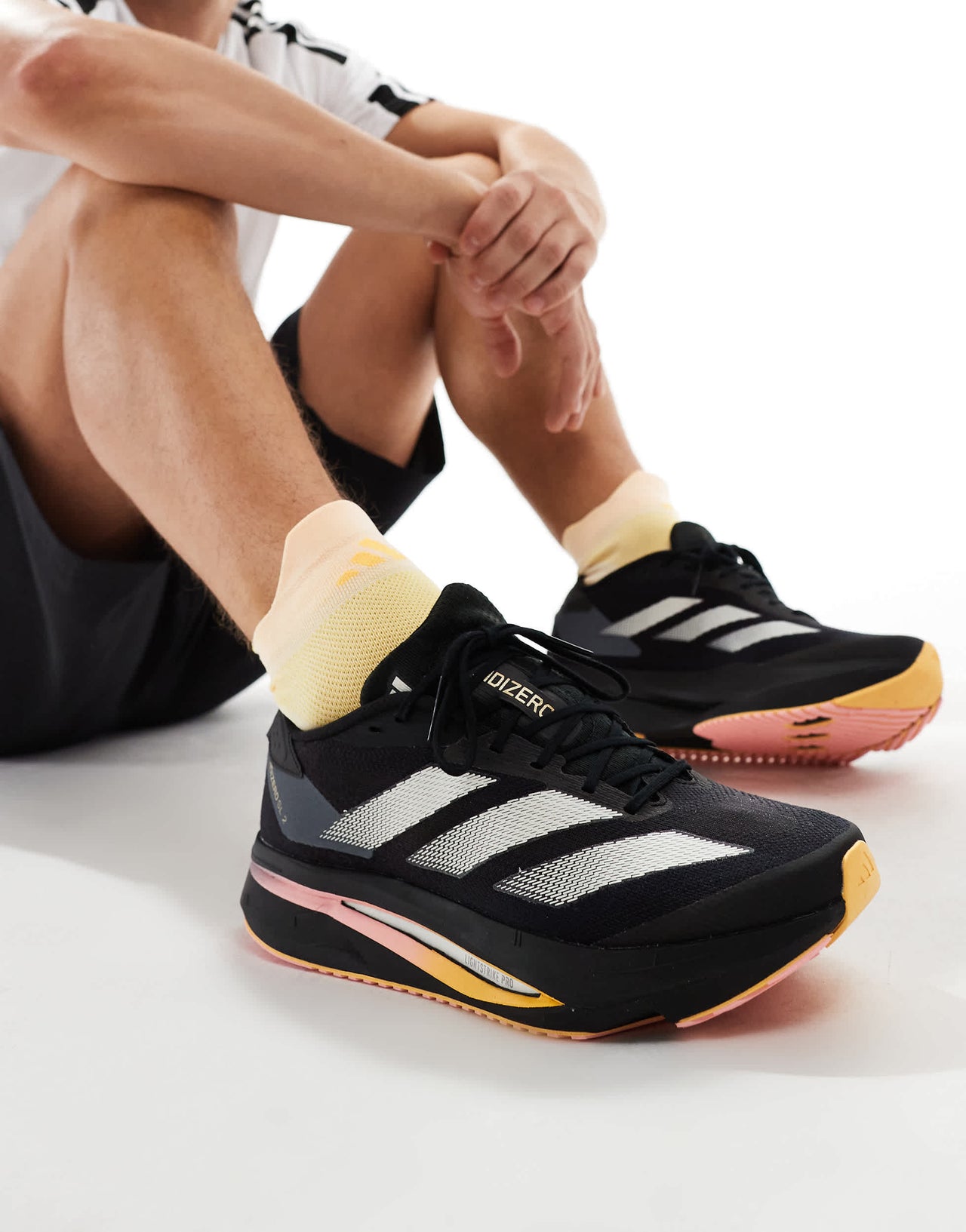 adidas Running Adizero SL2 trainers in black and orange