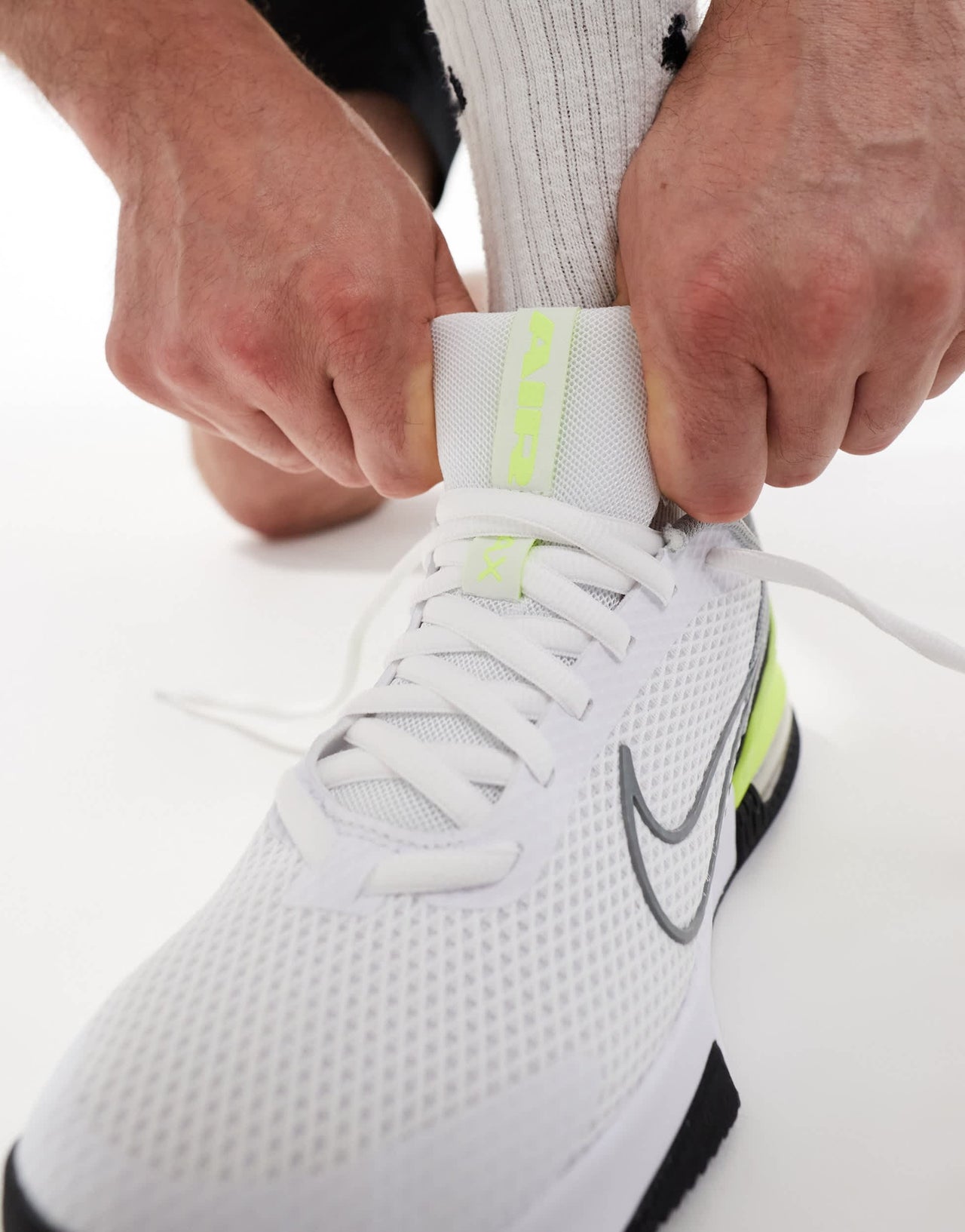 Nike Training Air Max Alpha 6 trainers in white and green