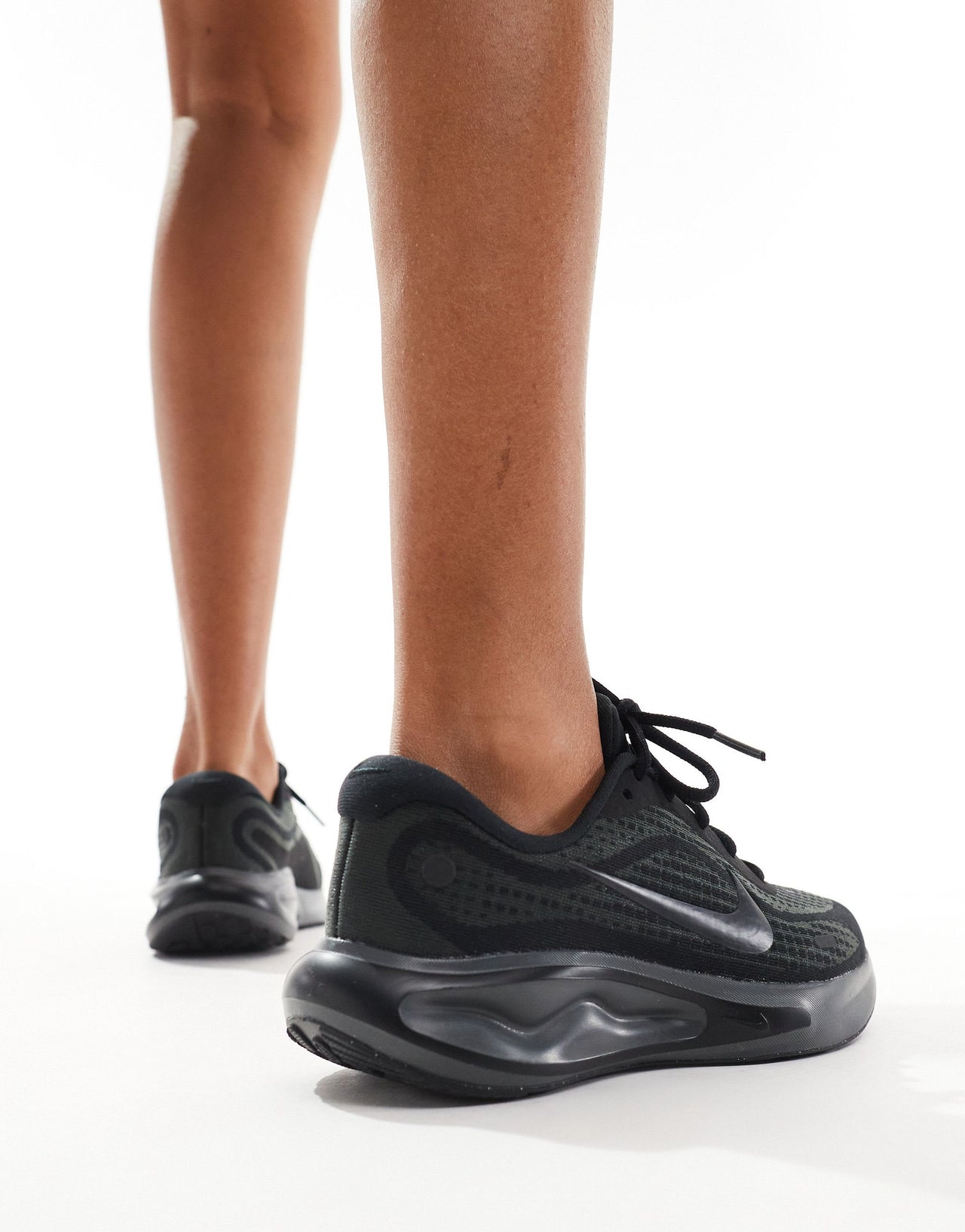 Nike Running Journey Run trainers in black