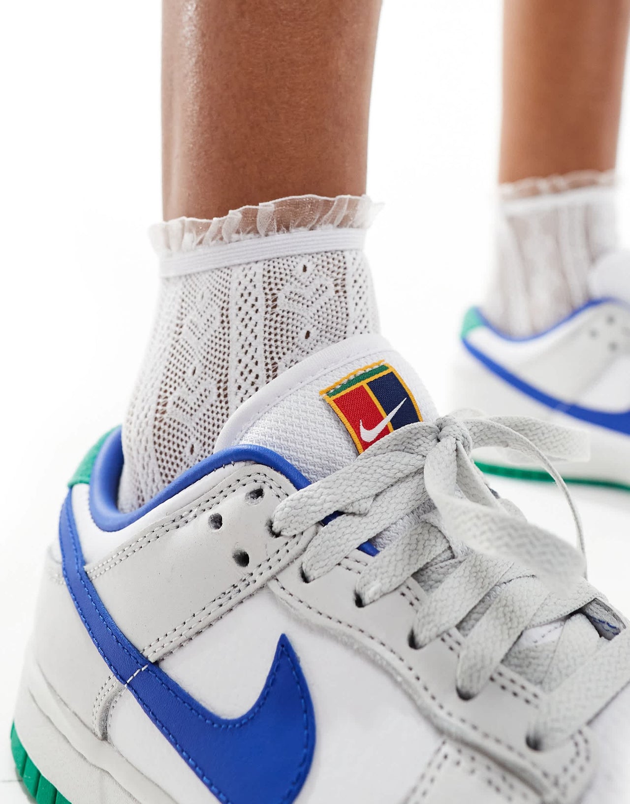 Nike Dunk Low trainer in white and blue detail