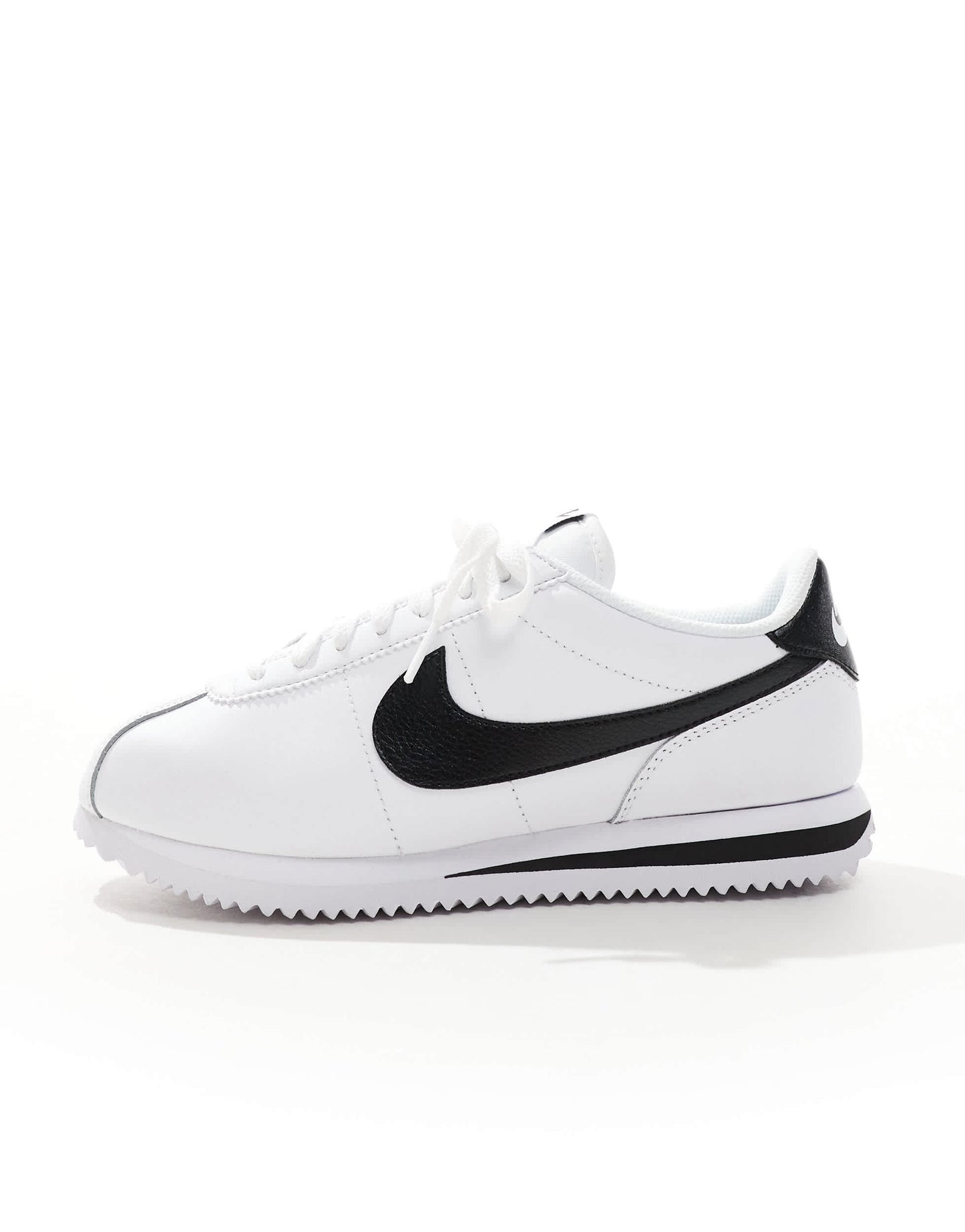 Nike Cortez trainers in white and black