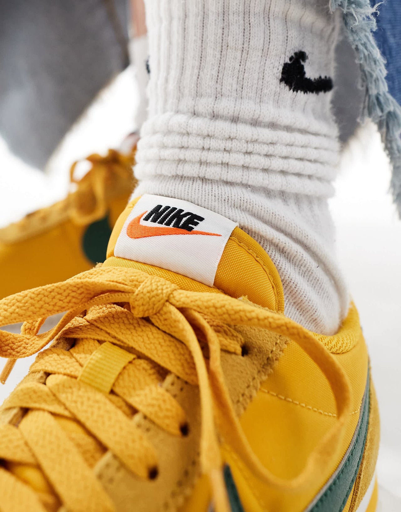 Nike Cortez TXT trainers in yellow and green
