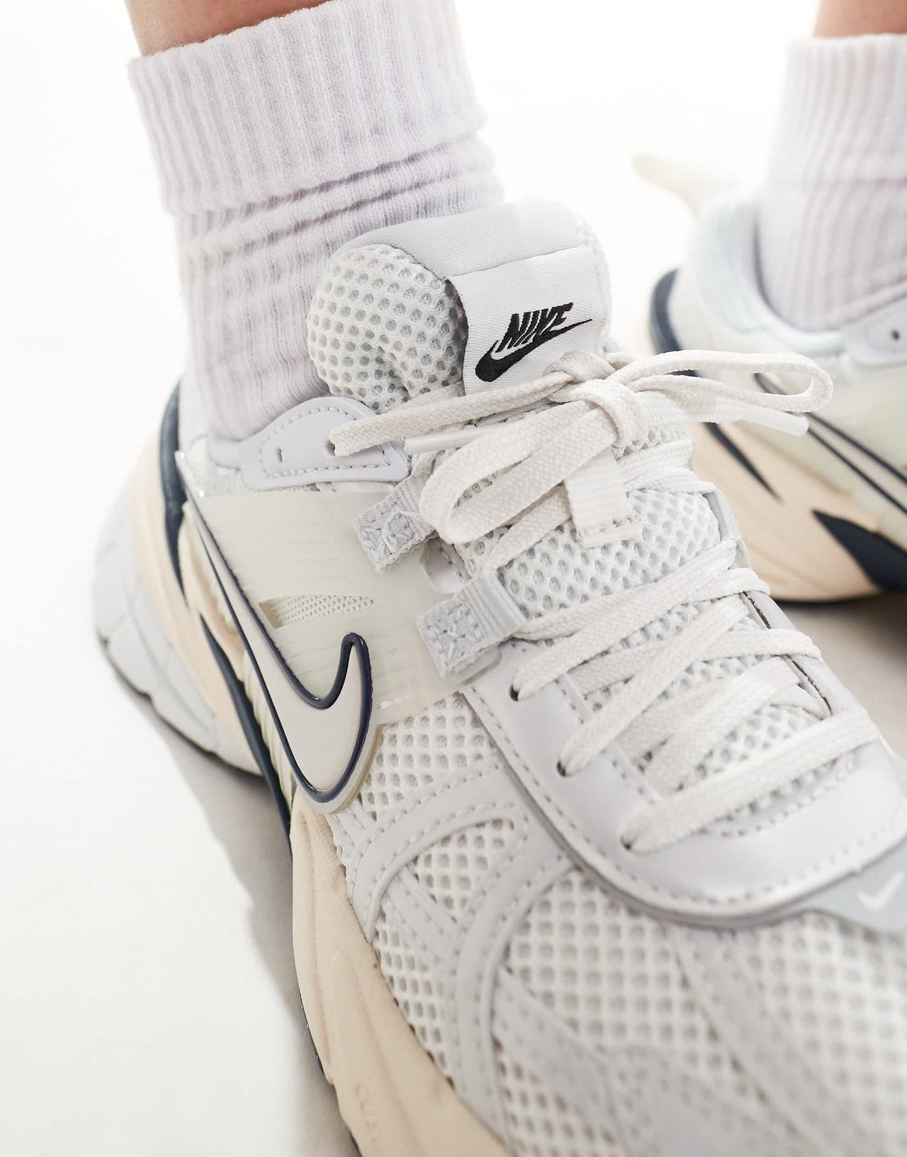 Nike V2K Run trainers in white and navy