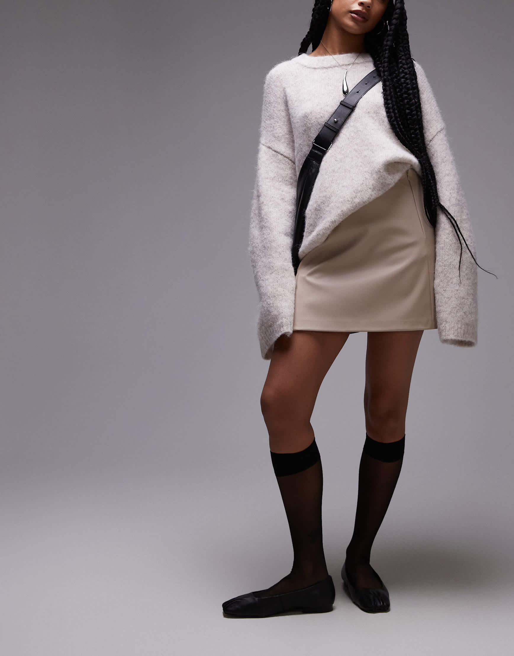 Topshop Petite faux leather step hem mini skirt in fawn