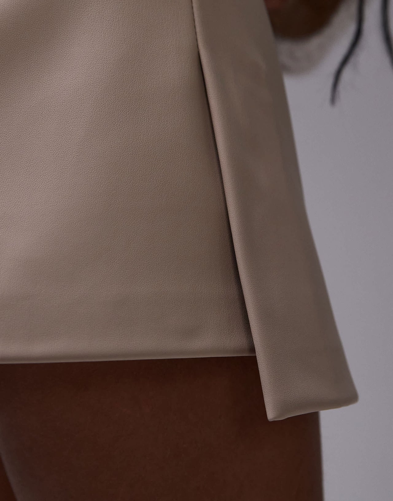 Topshop Petite faux leather step hem mini skirt in fawn