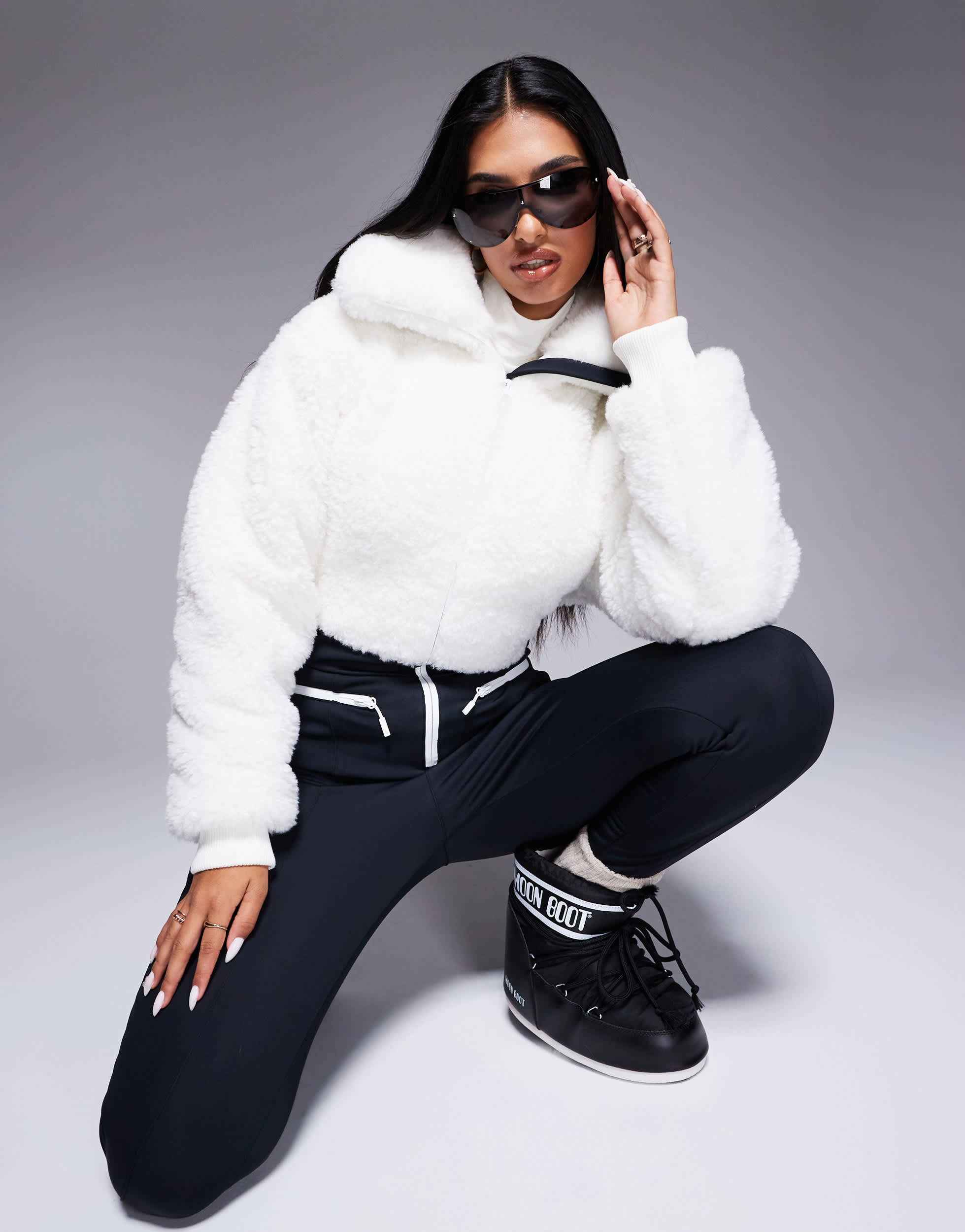 4505 Ski suit with faux fur panels and skinny leg in black and white
