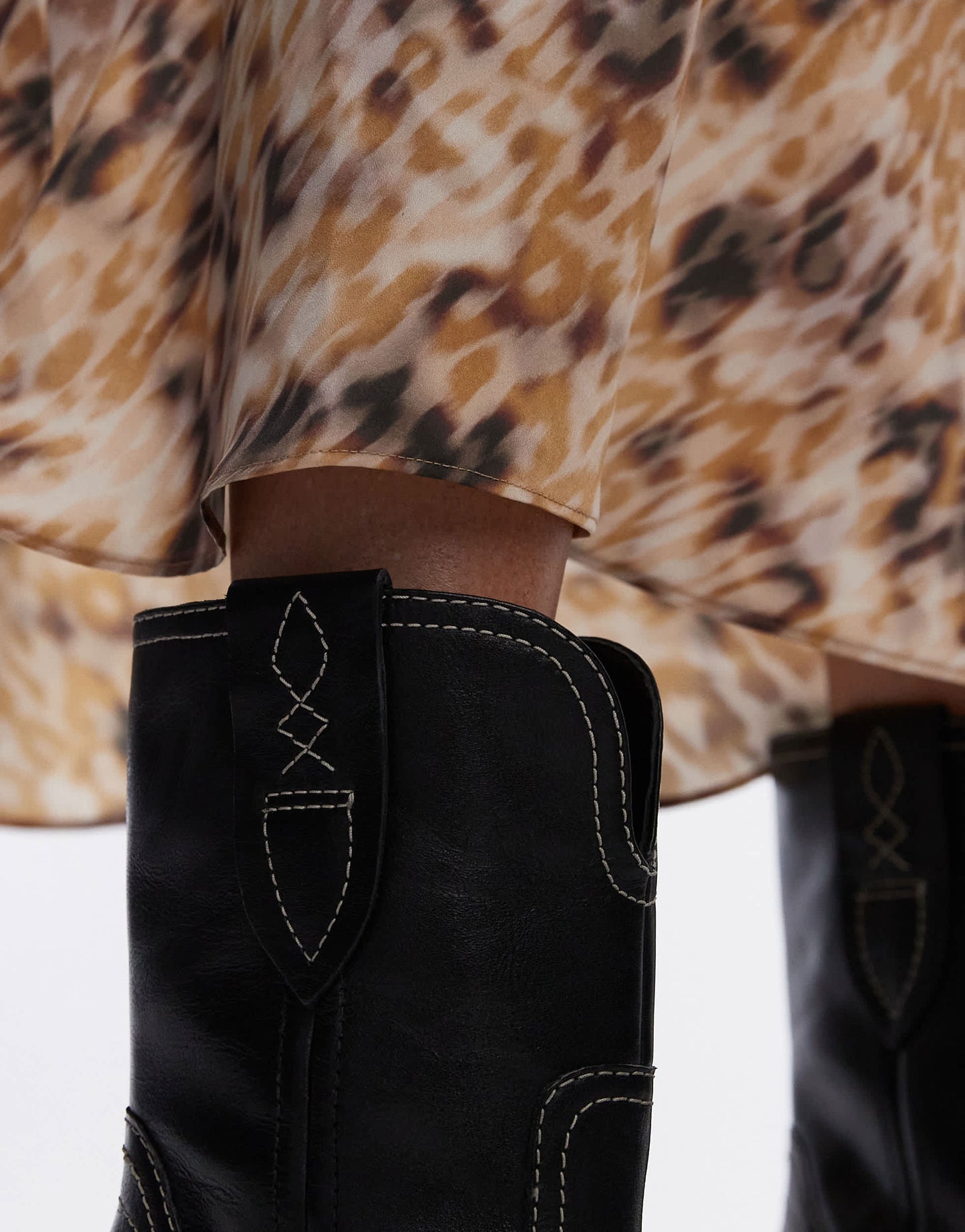 Free People contrast stitch leather western boots in black