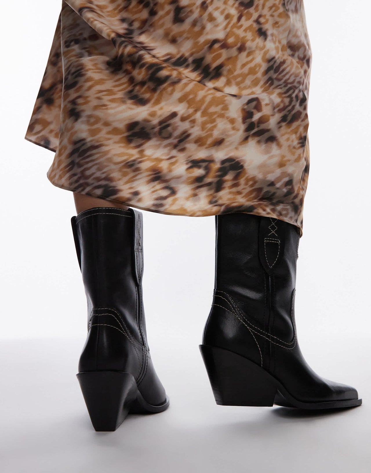 Free People contrast stitch leather western boots in black
