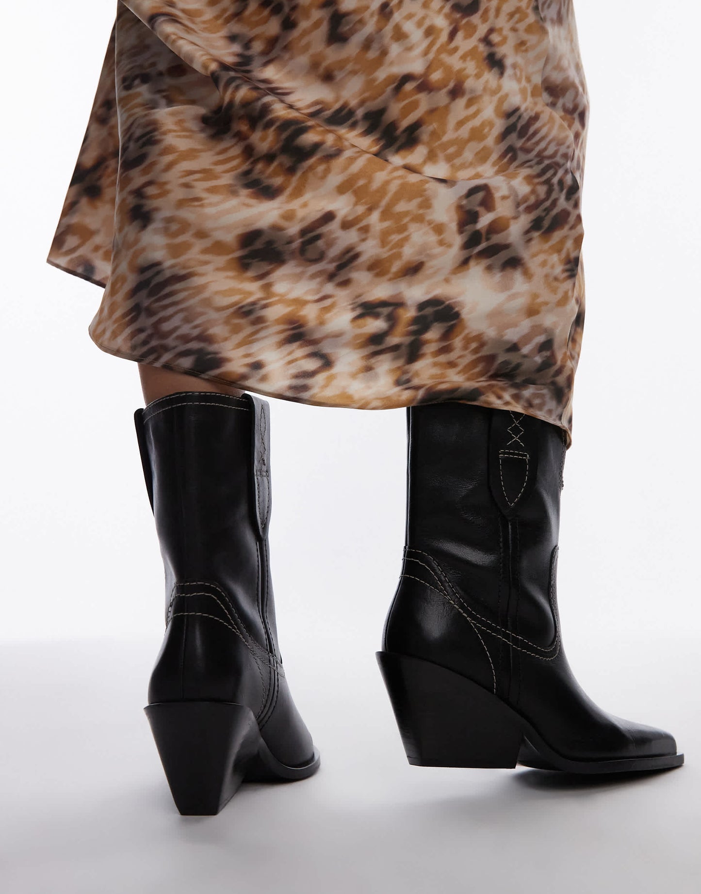 Free People contrast stitch leather western boots in black