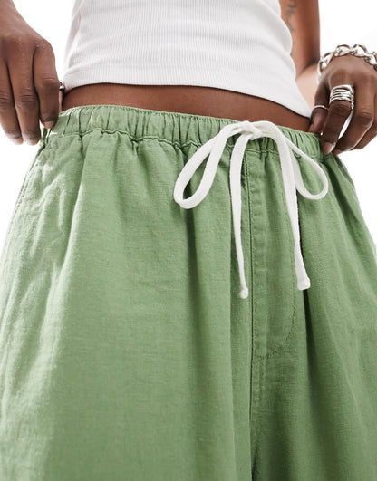 Weekday Unisex Patrik linen shorts in green exclusive to ASOS