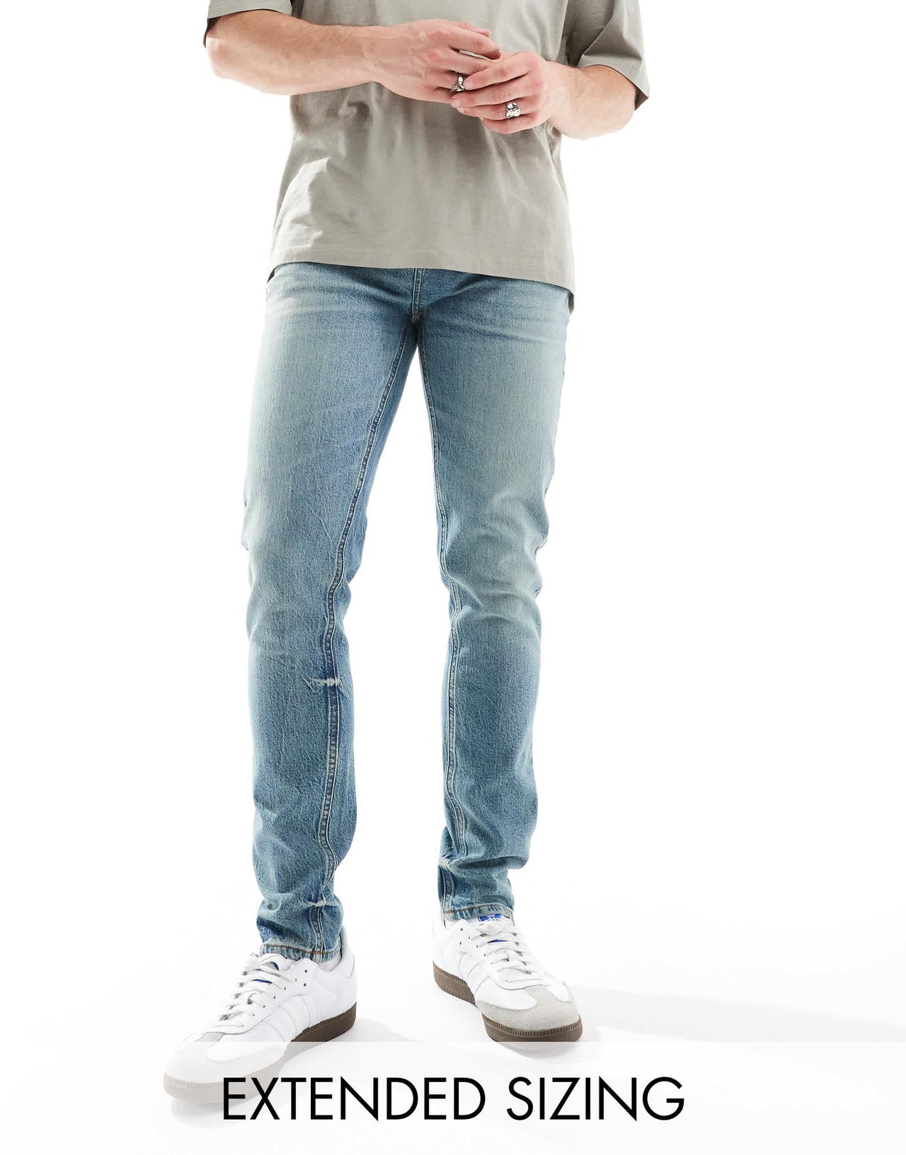 ASOS DESIGN skinny jeans in a tinted vintage mid wash