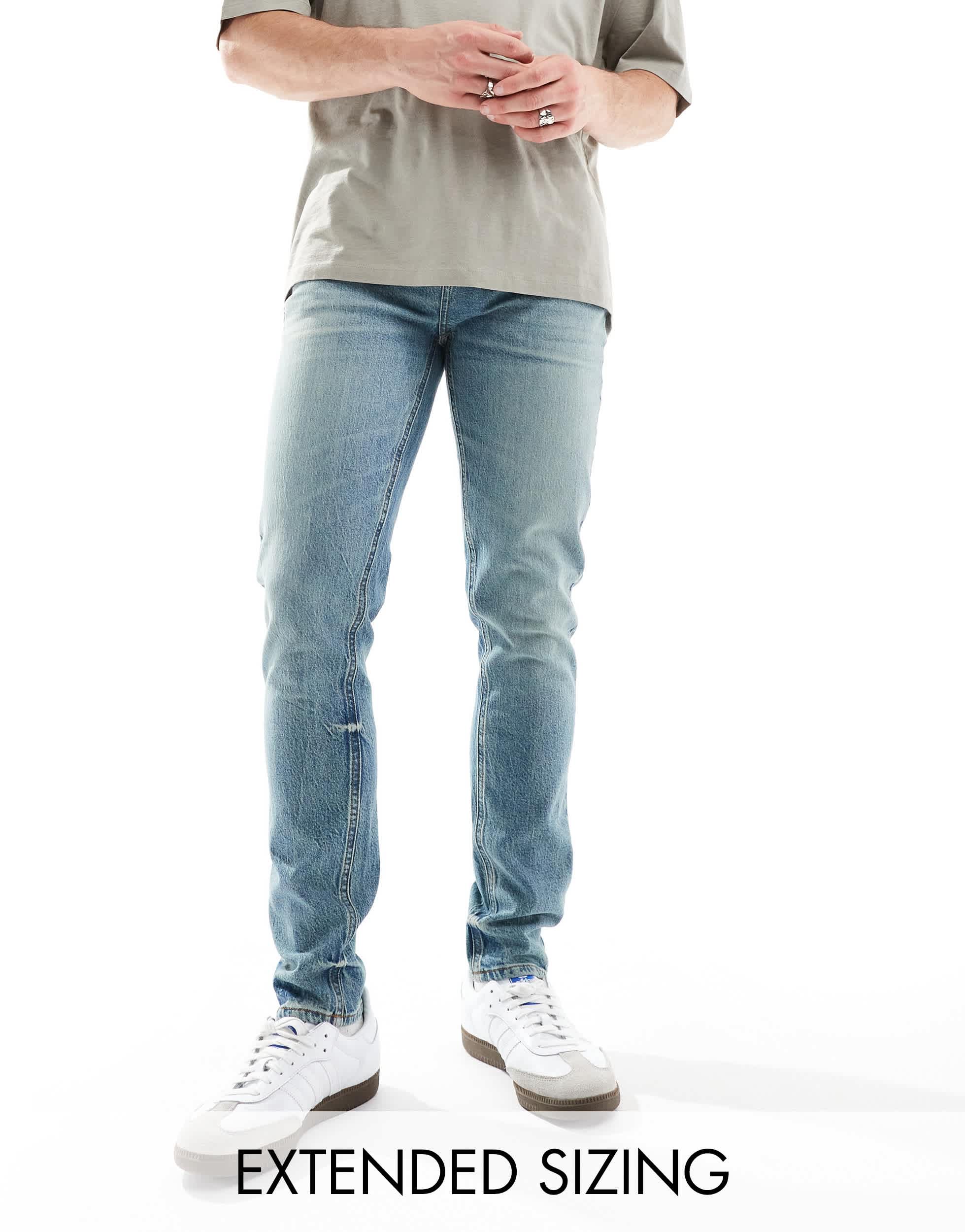 ASOS DESIGN skinny jeans in a tinted vintage mid wash