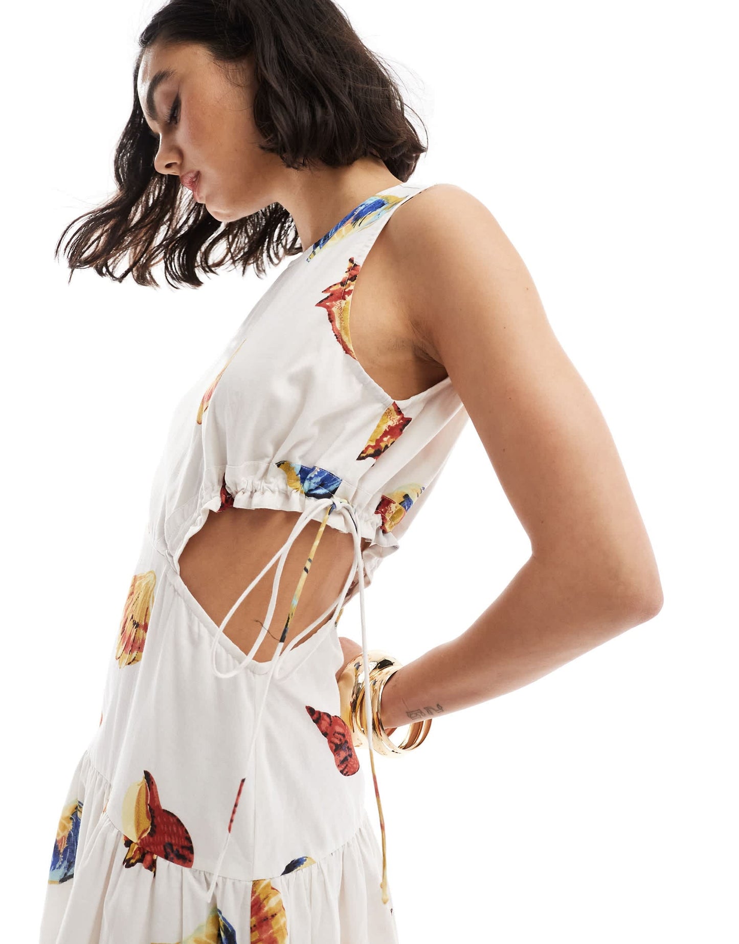ASOS DESIGN sleeveless cut out midi dress in all over shell print