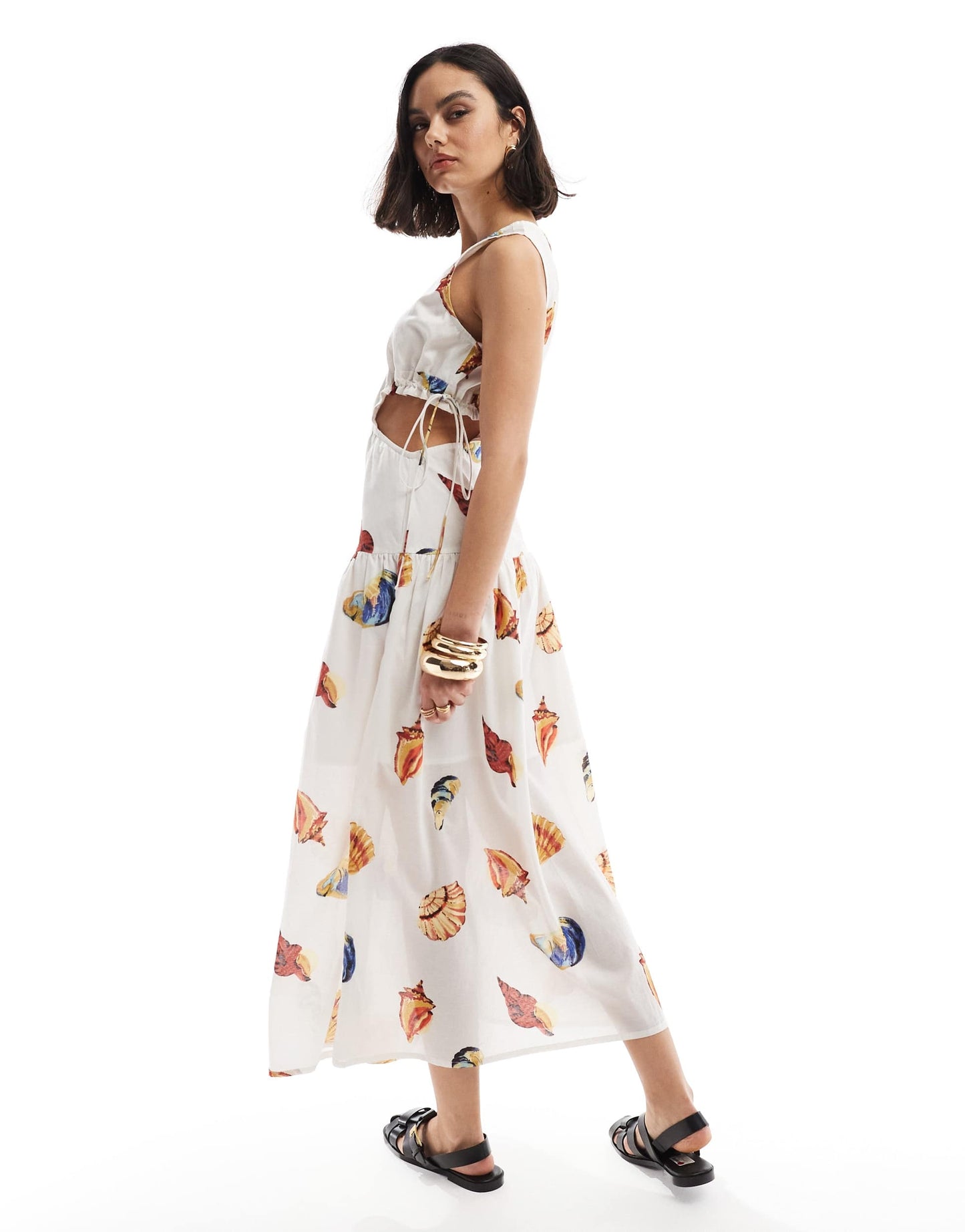 ASOS DESIGN sleeveless cut out midi dress in all over shell print