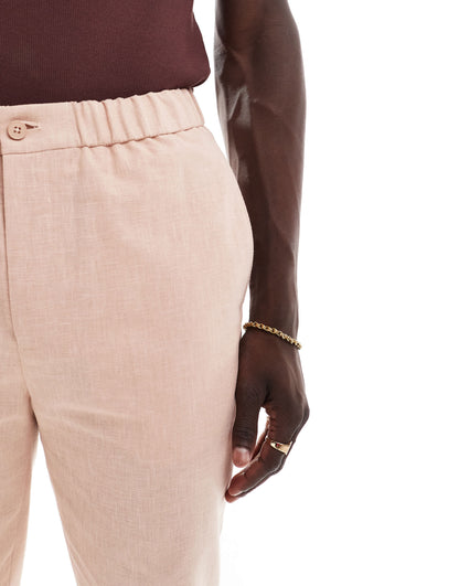 ASOS DESIGN tapered with linen pull on suit trouser in pink