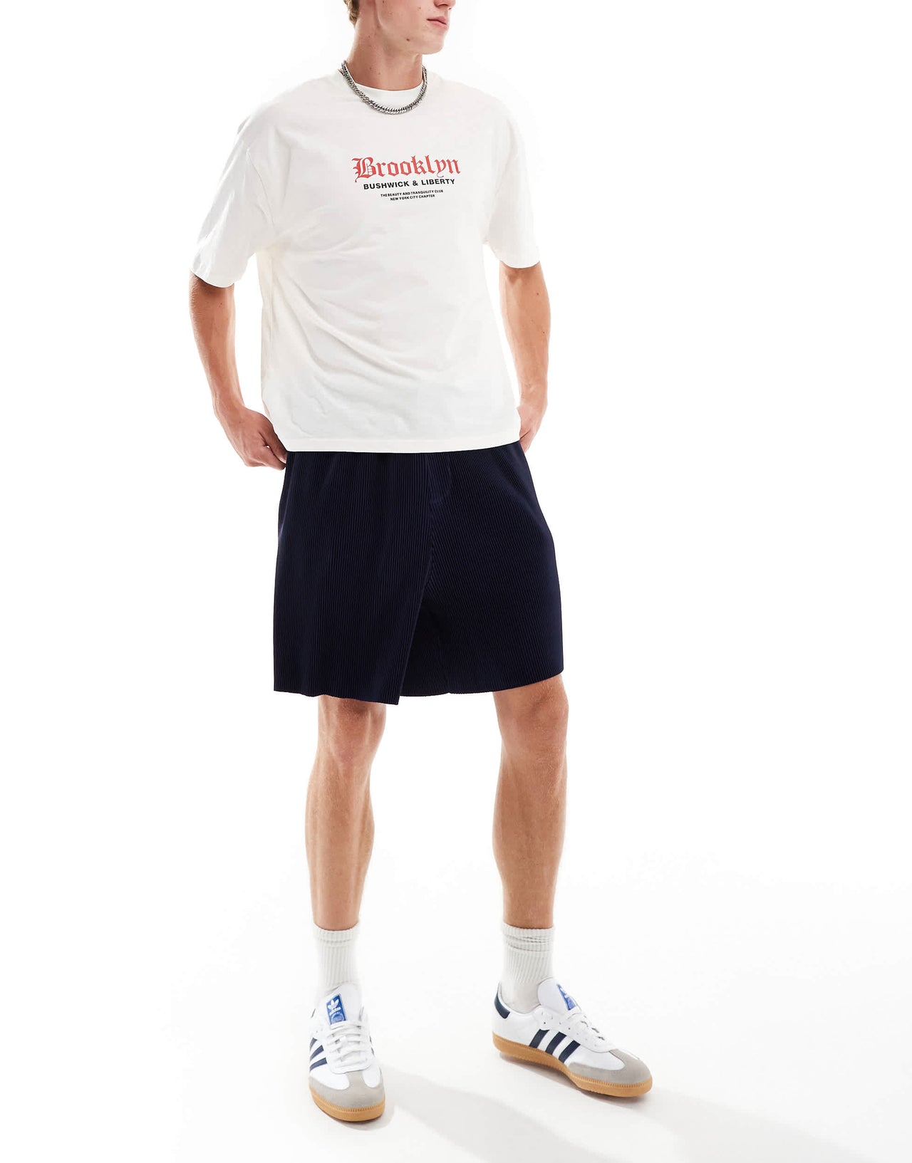 ASOS DESIGN oversized plisse texture shorts in navy