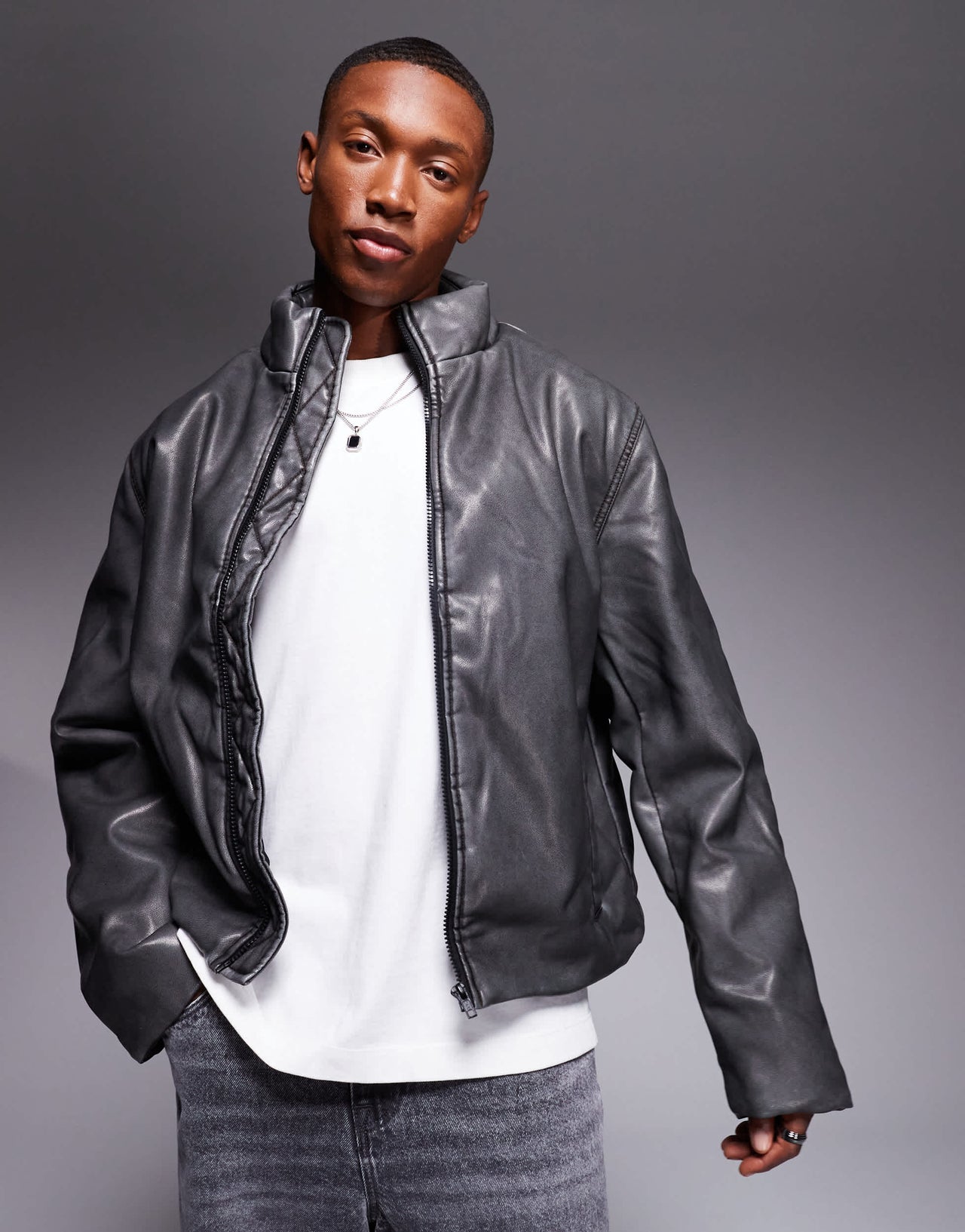 ASOS DESIGN washed faux leather puffer jacket in black