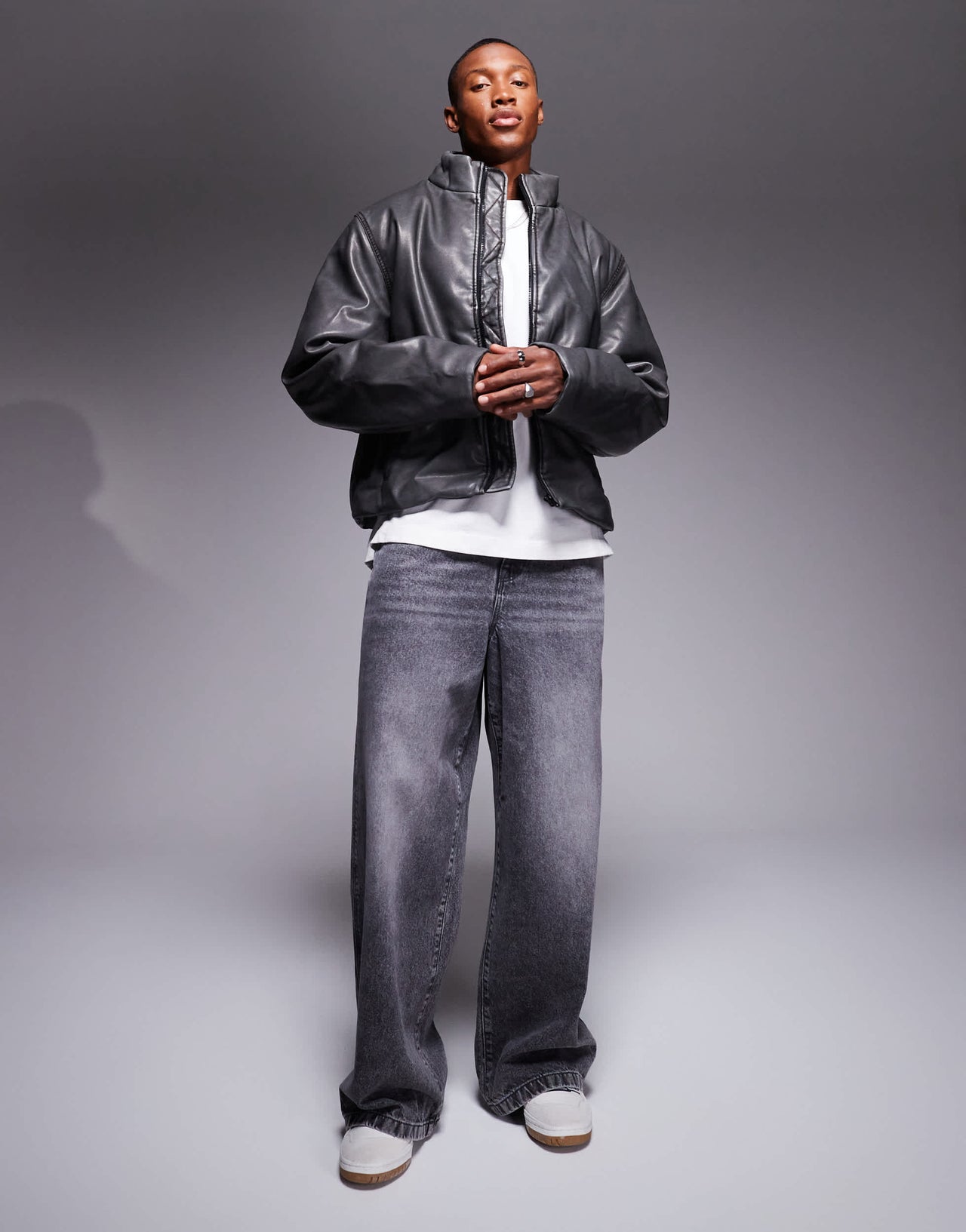 ASOS DESIGN washed faux leather puffer jacket in black