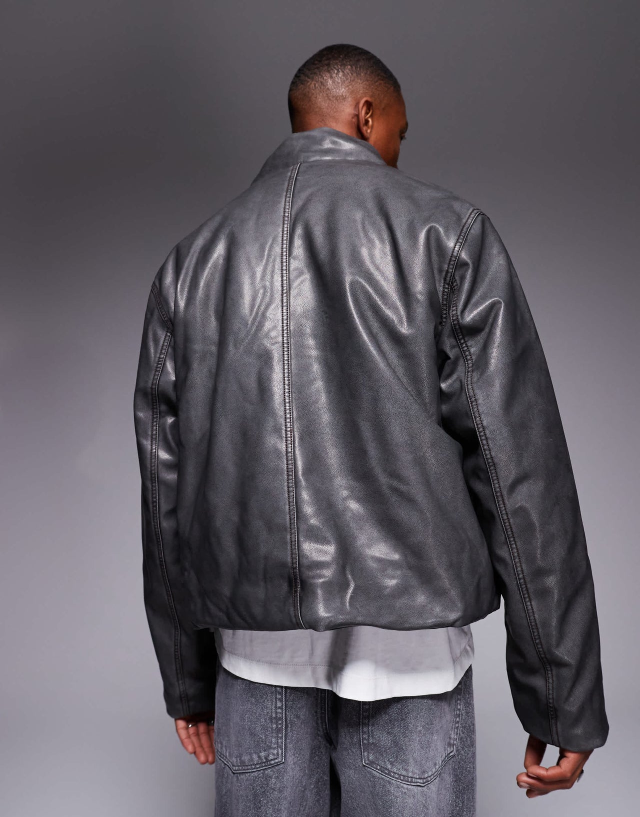 ASOS DESIGN washed faux leather puffer jacket in black