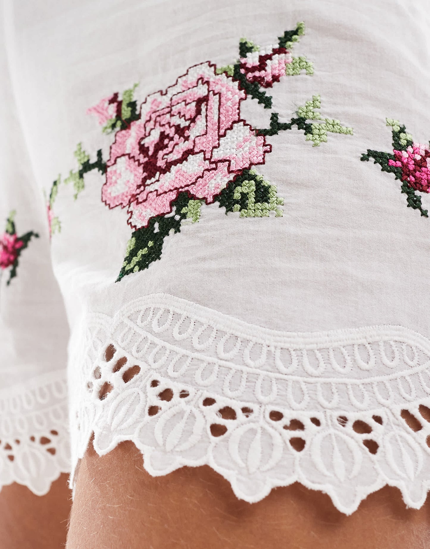 Reclaimed Vintage mini shorts with floral tablecloth embroidery in white