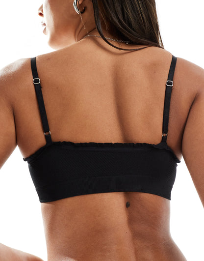 ASOS DESIGN Jilly ribbed crop top with ruffle trim in black