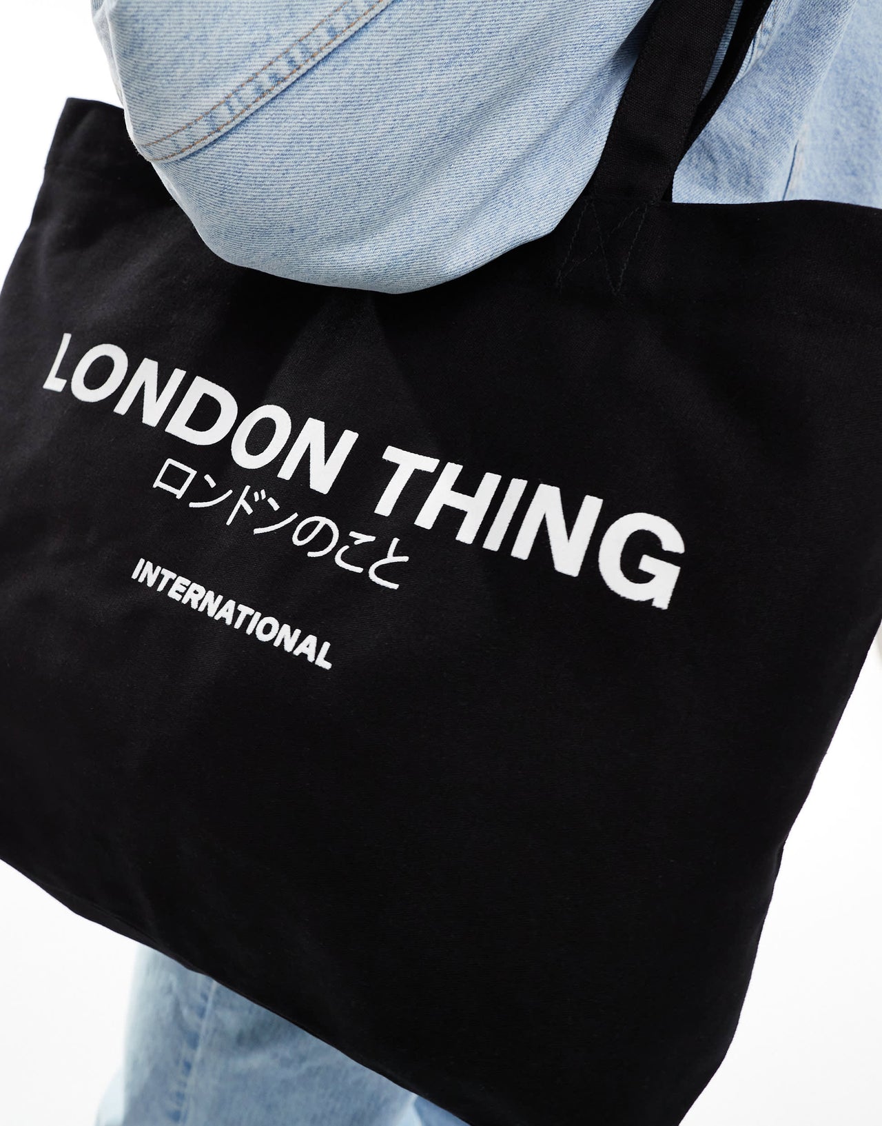 ASOS DESIGN heavyweight tote with London graphic in black