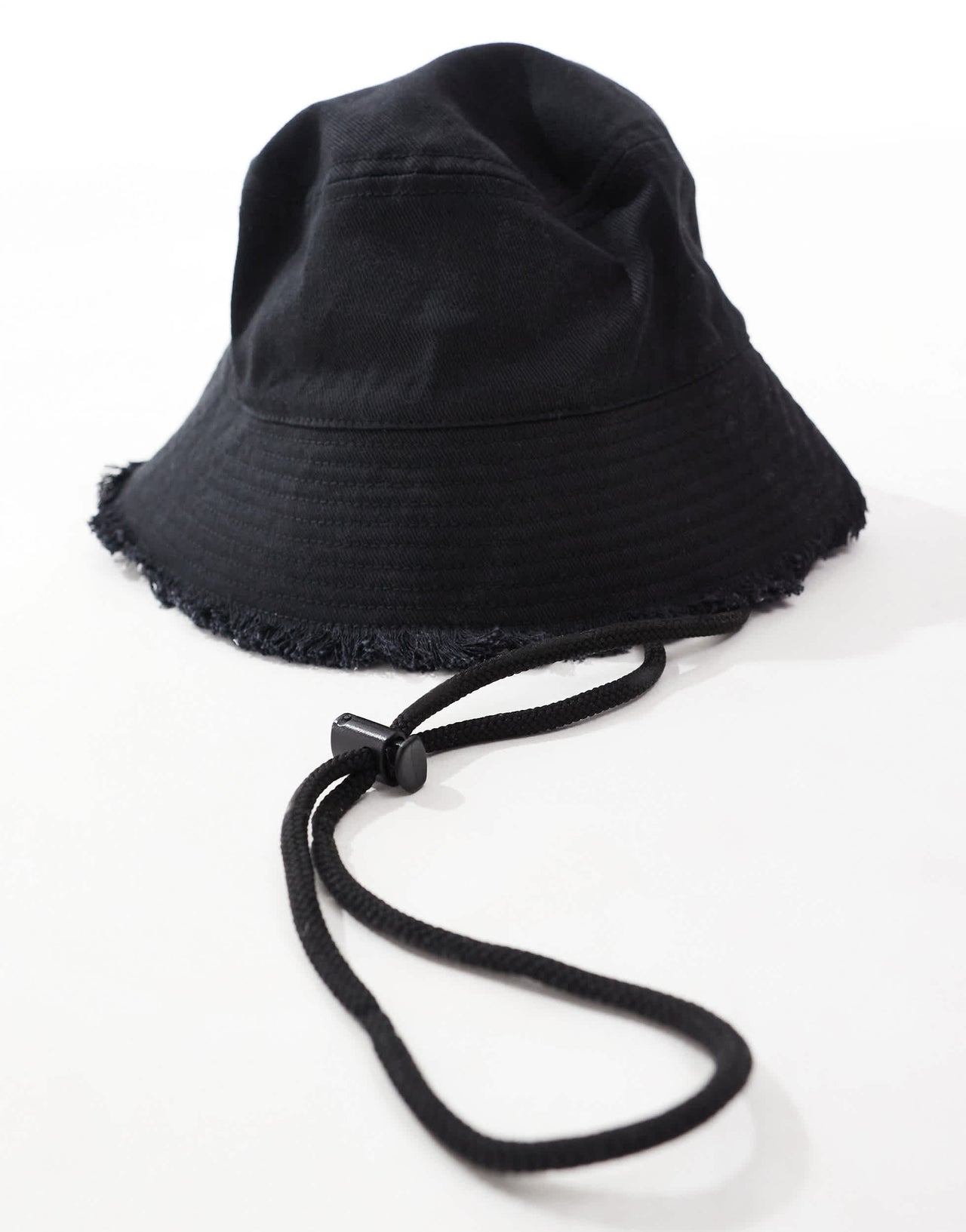 ASOS DESIGN cotton safari bucket hat with frayed edge in black